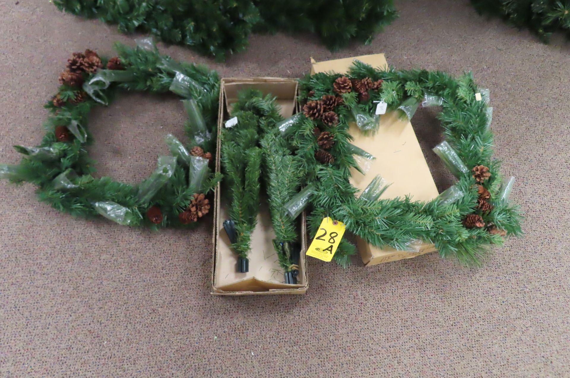 (2) ARTIFICIAL RECTANUGLAR WREATHS WITH PINECONES AND (4) 18 IN. TABLETOP TREES