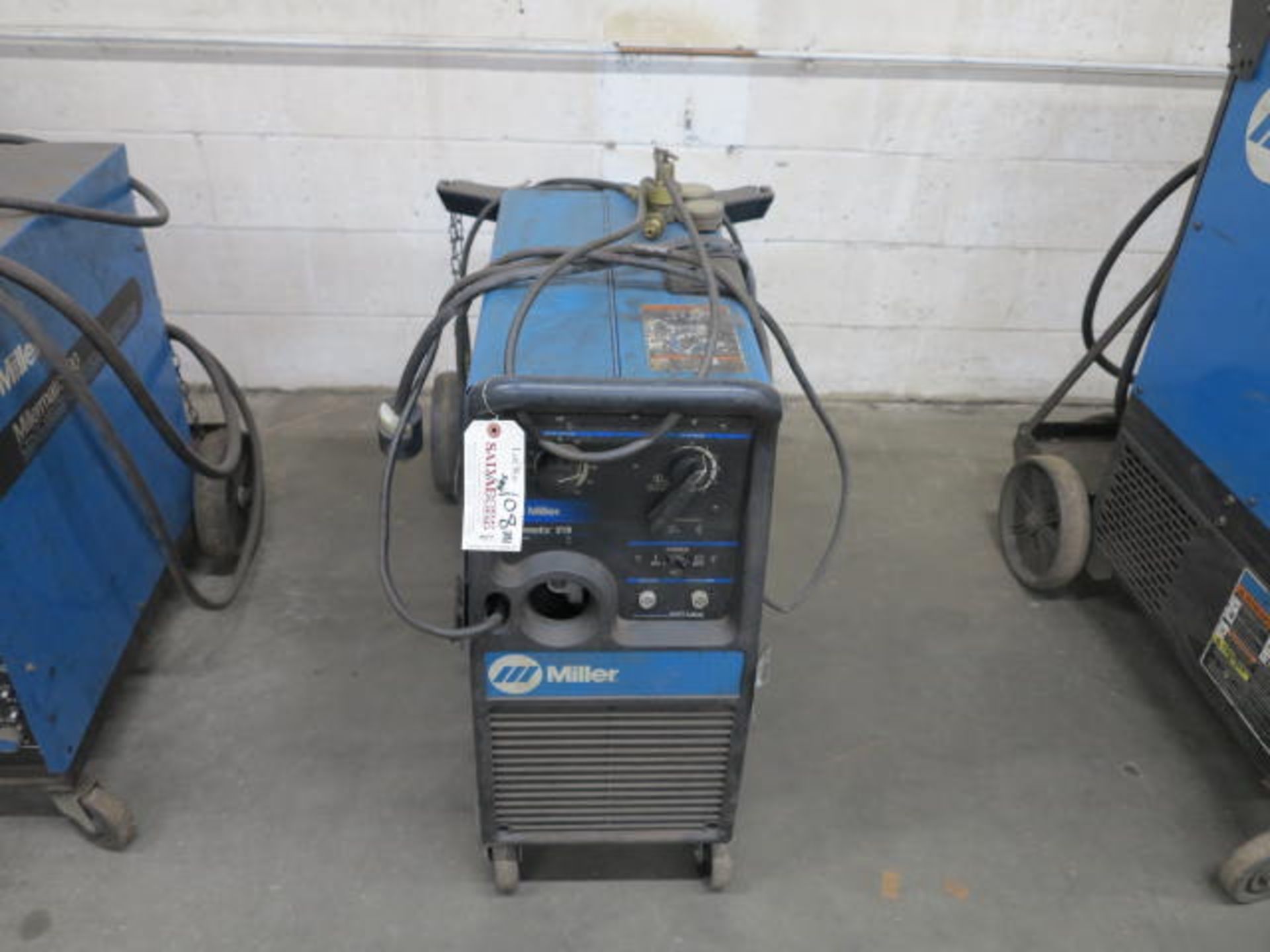 Miller Millermatic 210 MIG Welder S/N LE198504 with Grounding Lead, Regulator, 220/240V