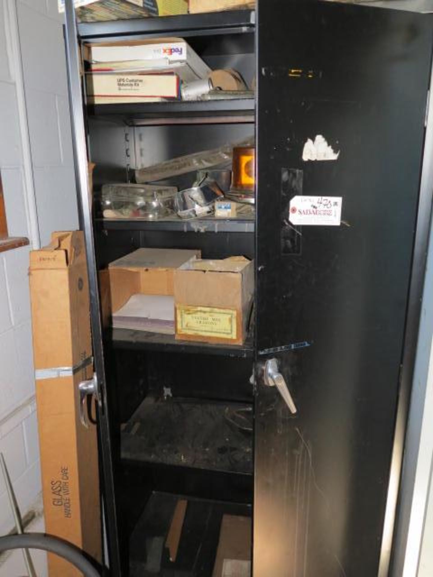 2 Door Storage Cabinet and Contents