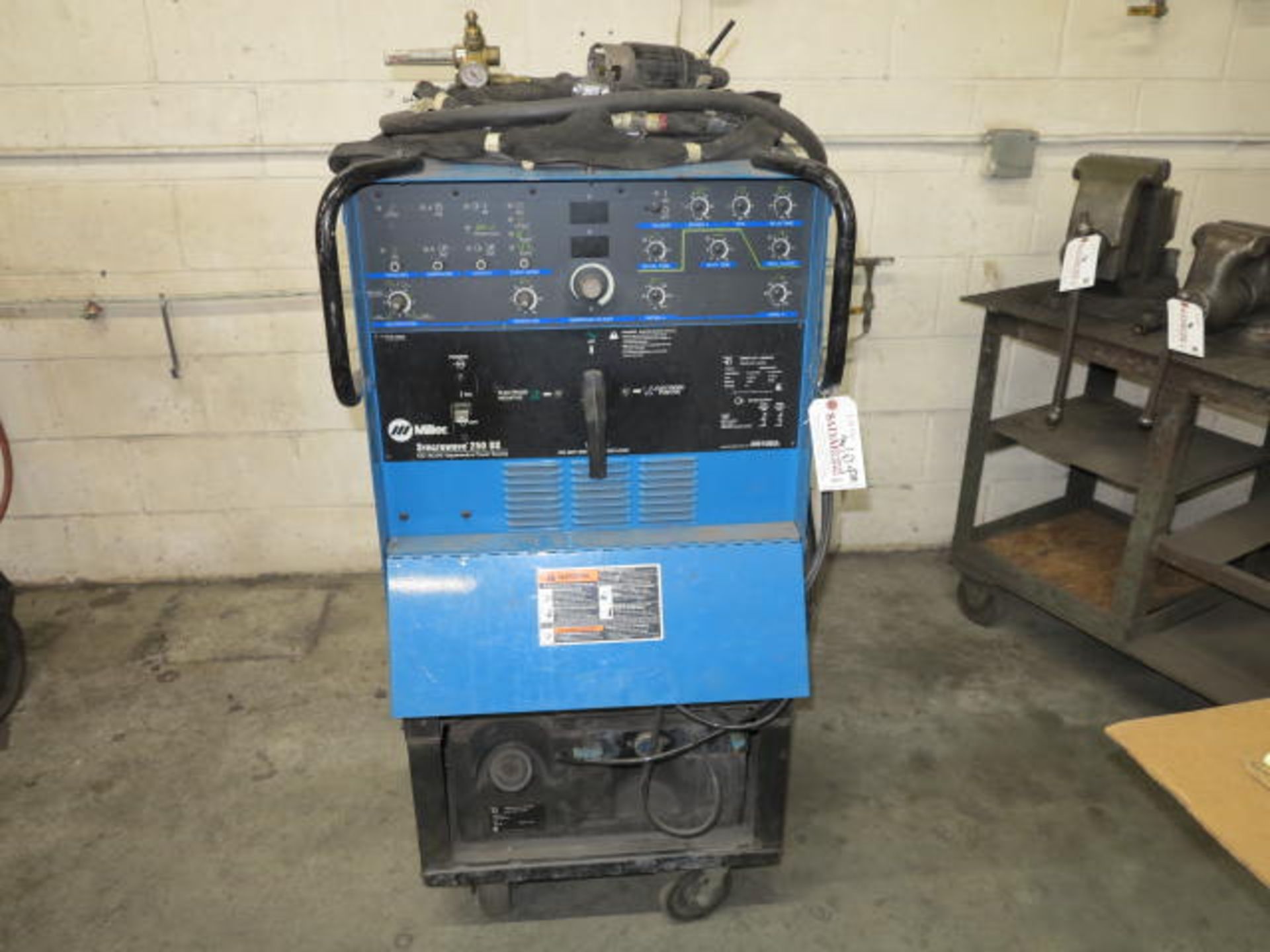 Miller Synchrowave 250DX TIGWelder S/N LB058198 with Foot Pedal, Grounding Lead, TIG Gun, Regulator,