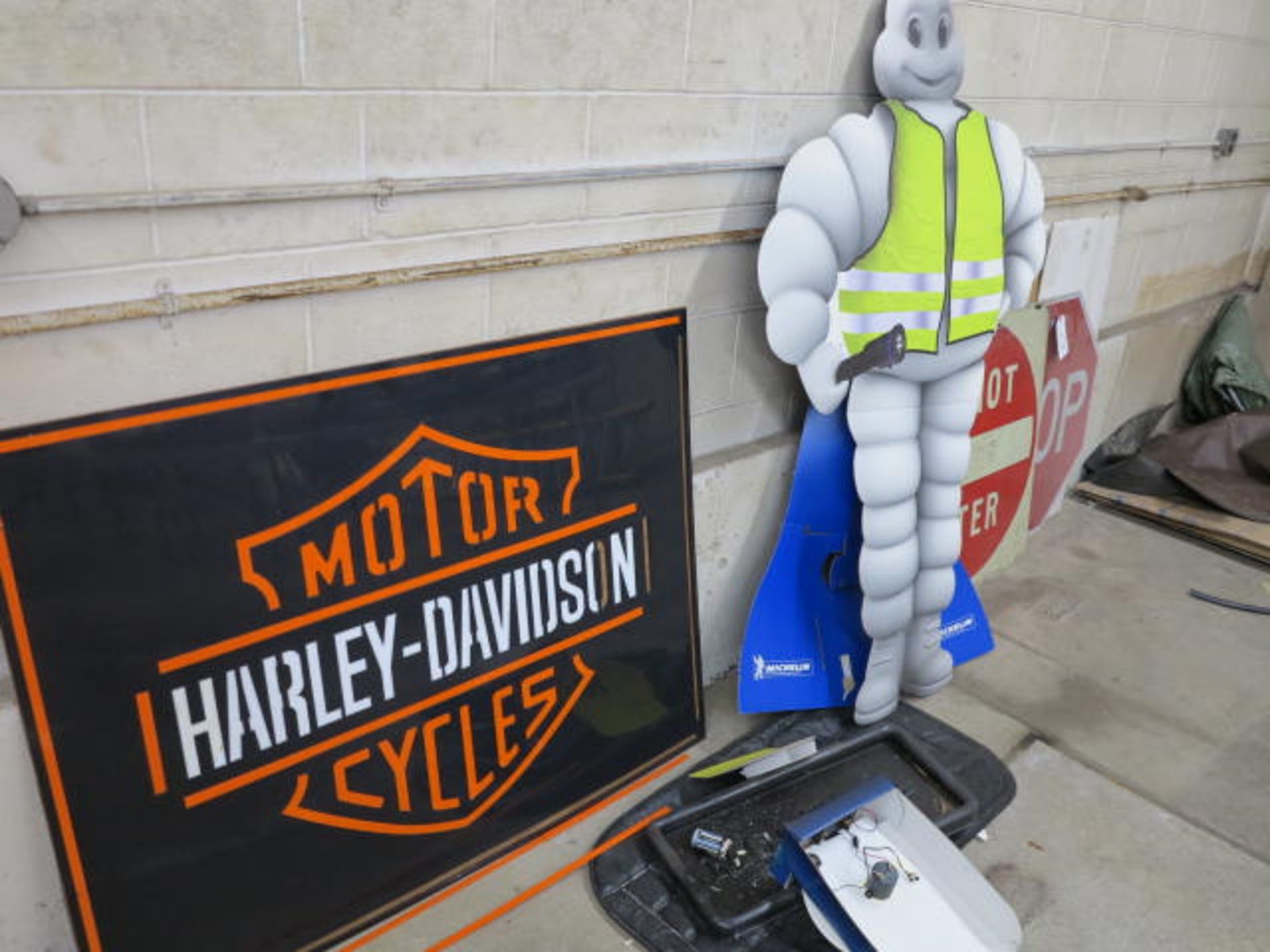 Lot Road and Harley Davidson Signs