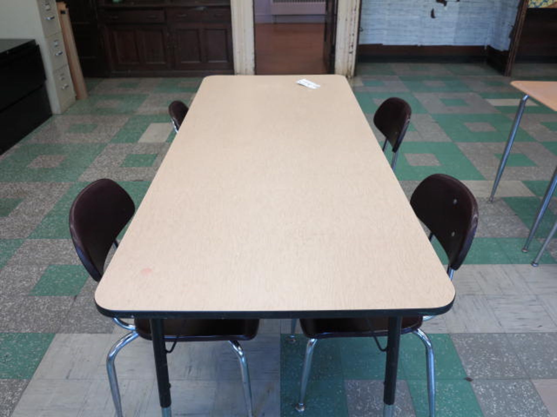 Work Table with (4) Chairs Located in Room 15