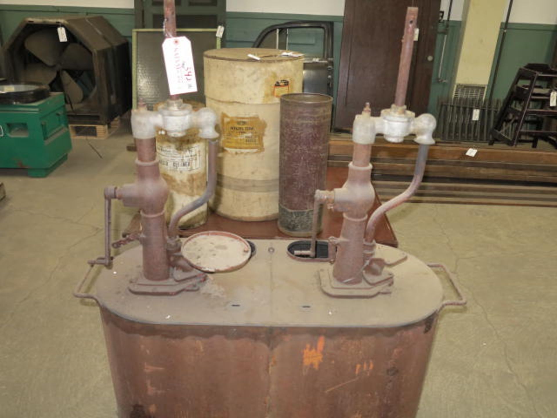 Antique Oil Transfer Pump Located at 93 Macondrey St Cumberland, RI