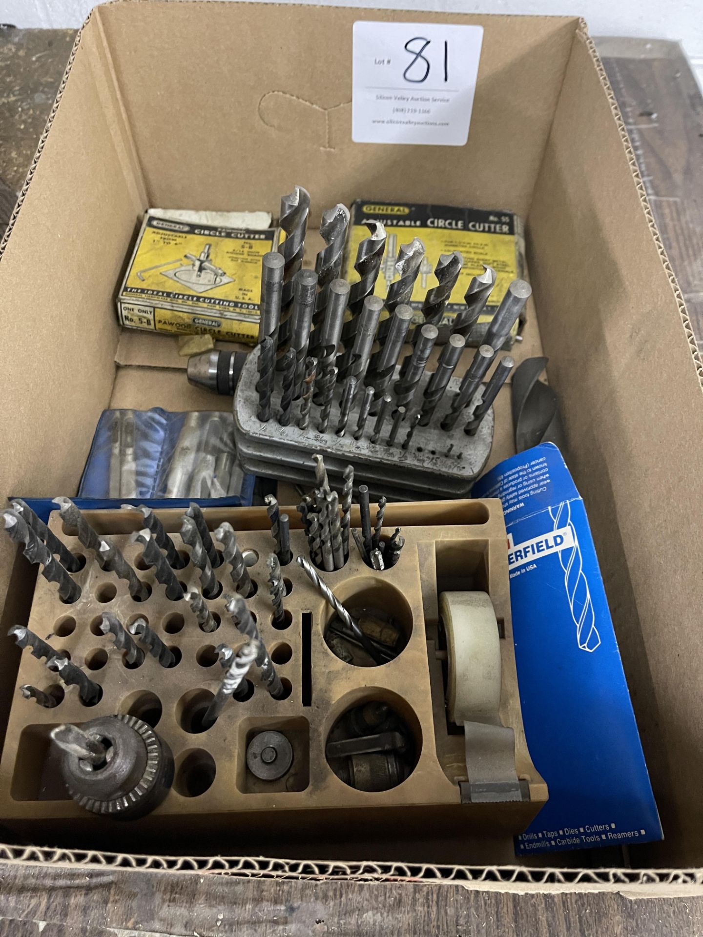 Miscellaneous drill bits, chuck key, and circle cutters