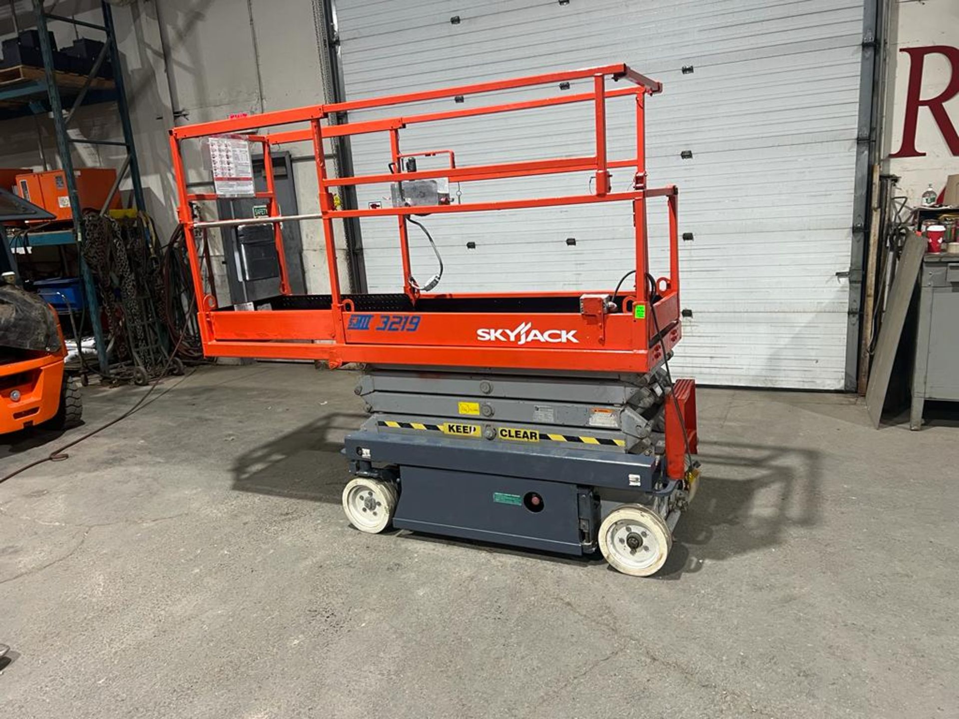 SkyJack III Electric Scissor Lift model 3219 - 19 feet lift, 32 inch width deck with pendant control - Image 3 of 5