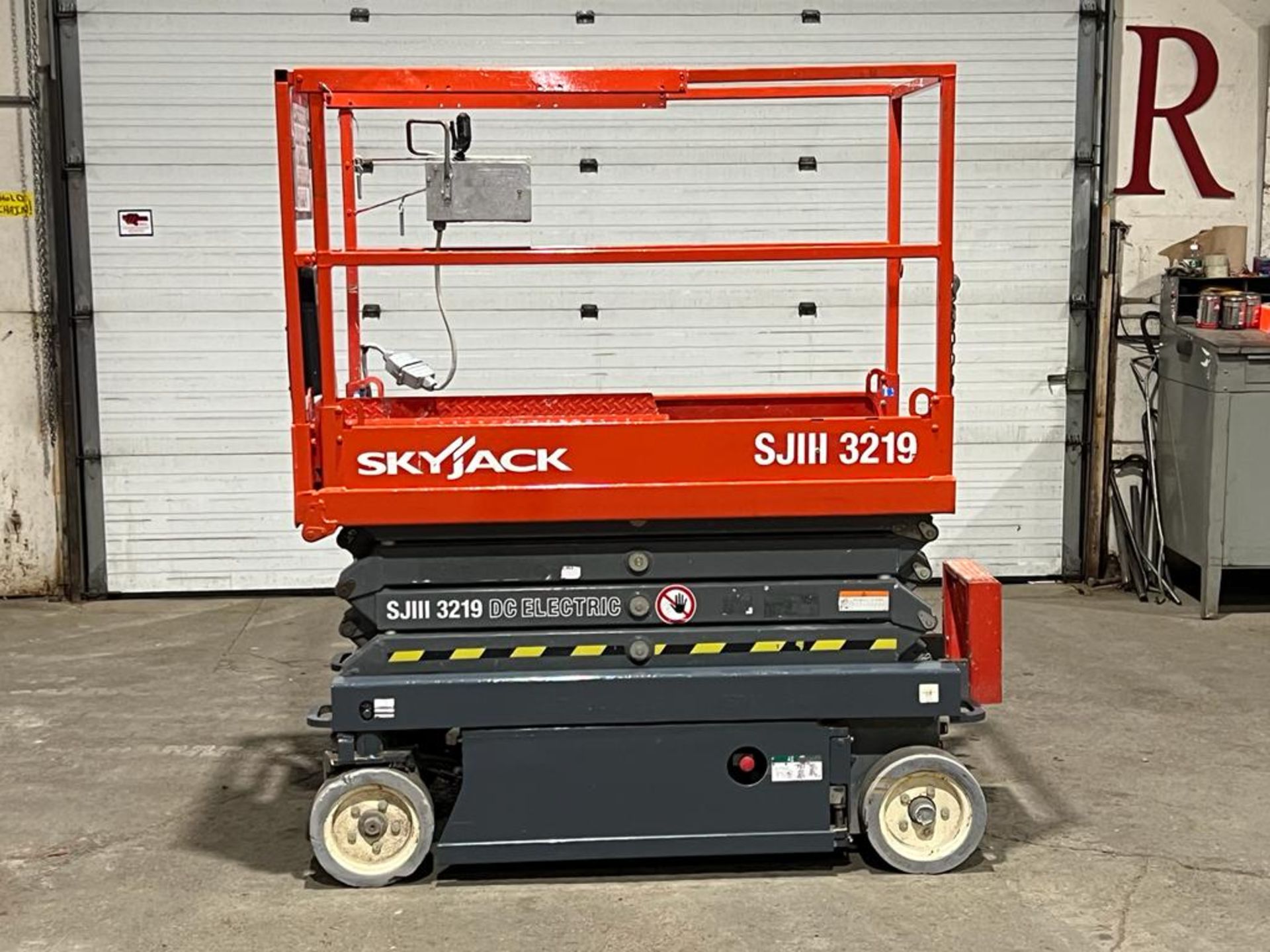 2013 SkyJack III Electric Scissor Lift model 3219 - 19 feet lift, 32 inch width deck with pendant - Image 3 of 4