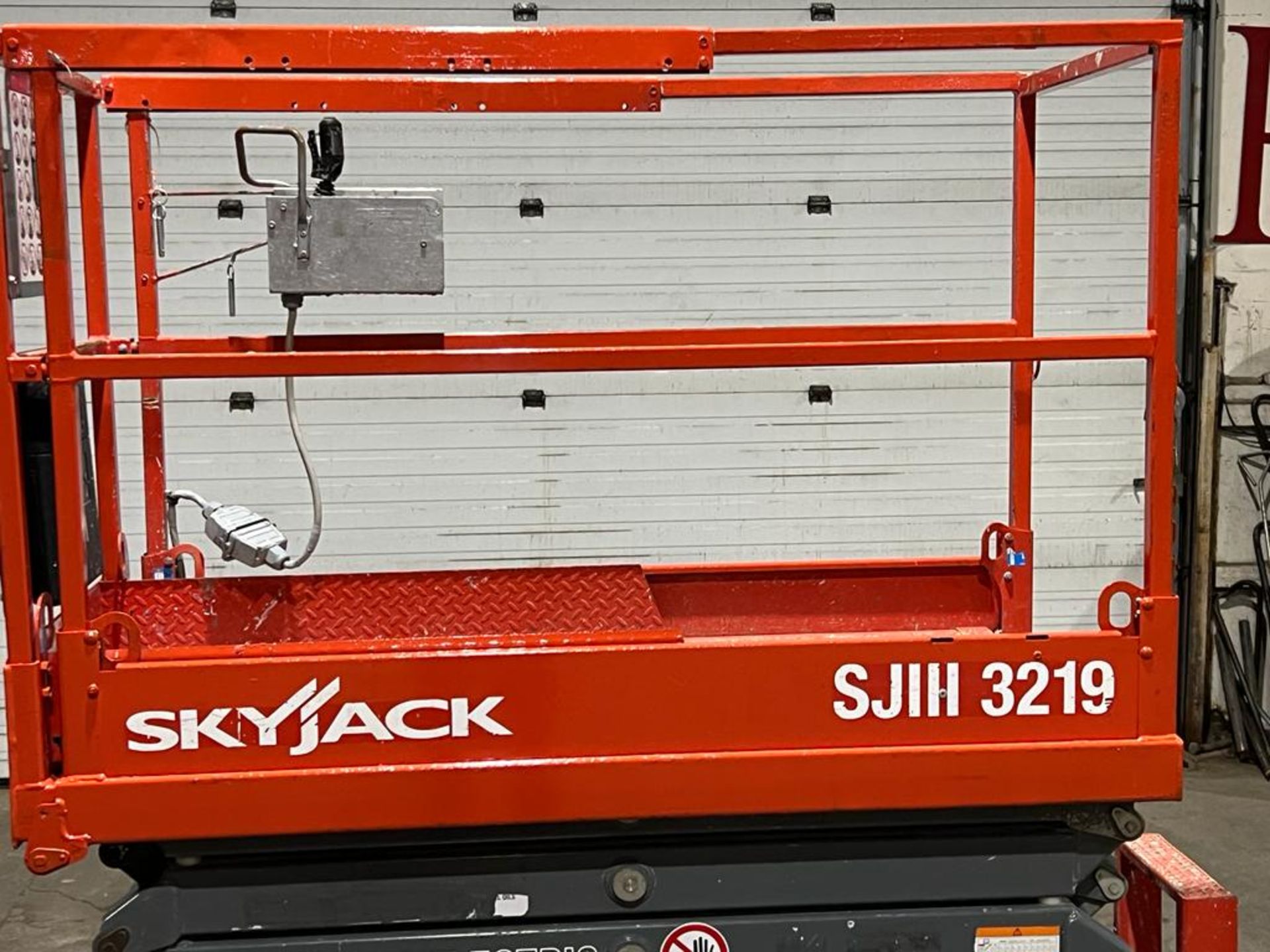 2013 SkyJack III Electric Scissor Lift model 3219 - 19 feet lift, 32 inch width deck with pendant - Image 2 of 4
