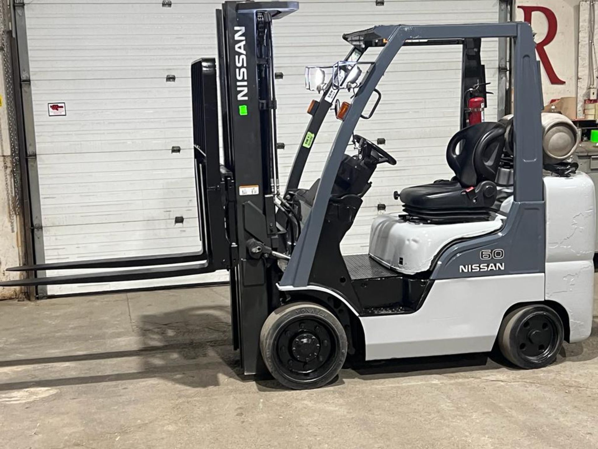 2013 Nissan 60 - 6,000lbs Capacity Forklift LPG (propane) with Sideshift & 3 stage mast with LOW