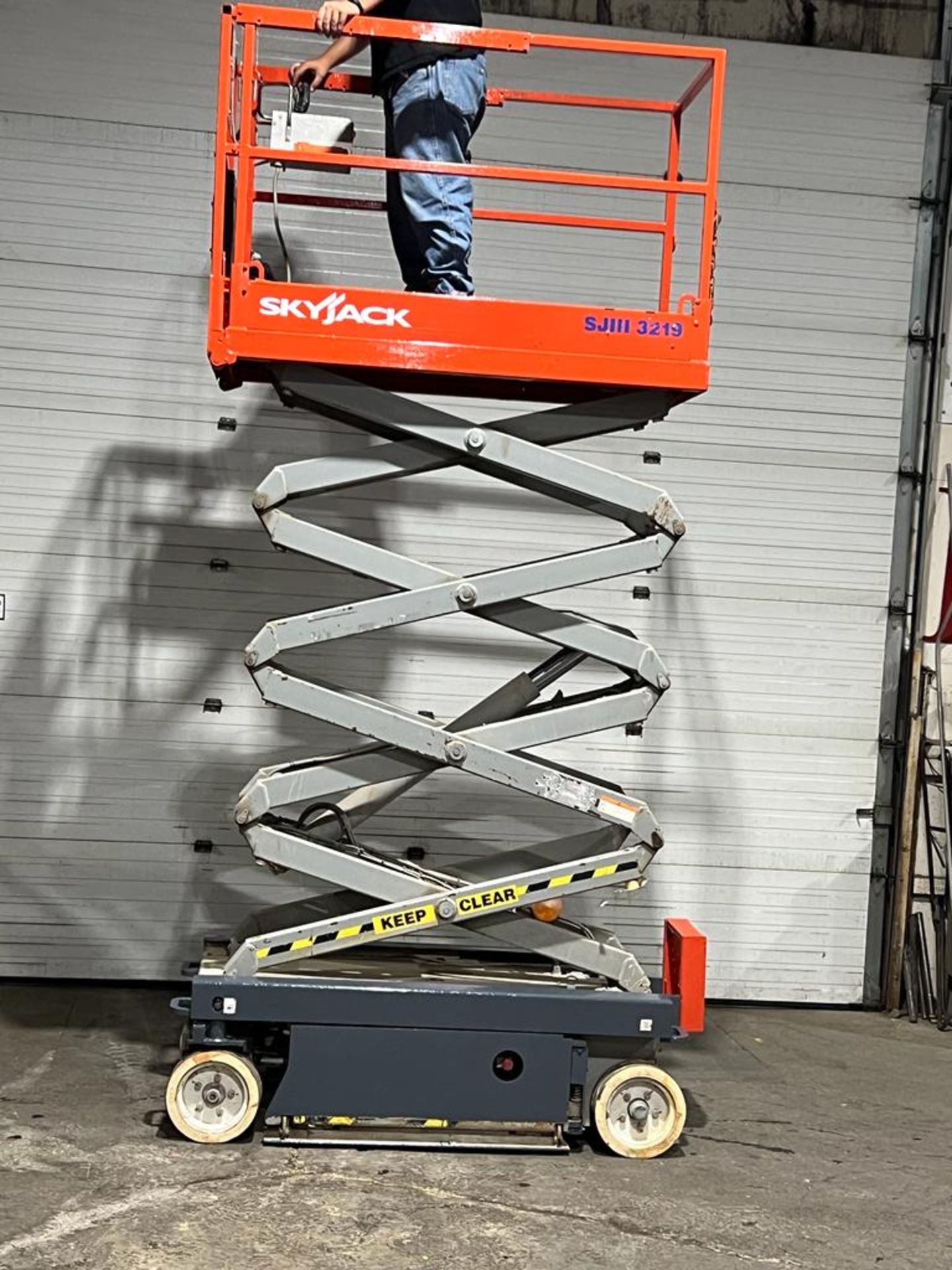 2013 SkyJack III Electric Scissor Lift model 3219 - 19 feet lift, 32 inch width deck with pendant - Image 2 of 3