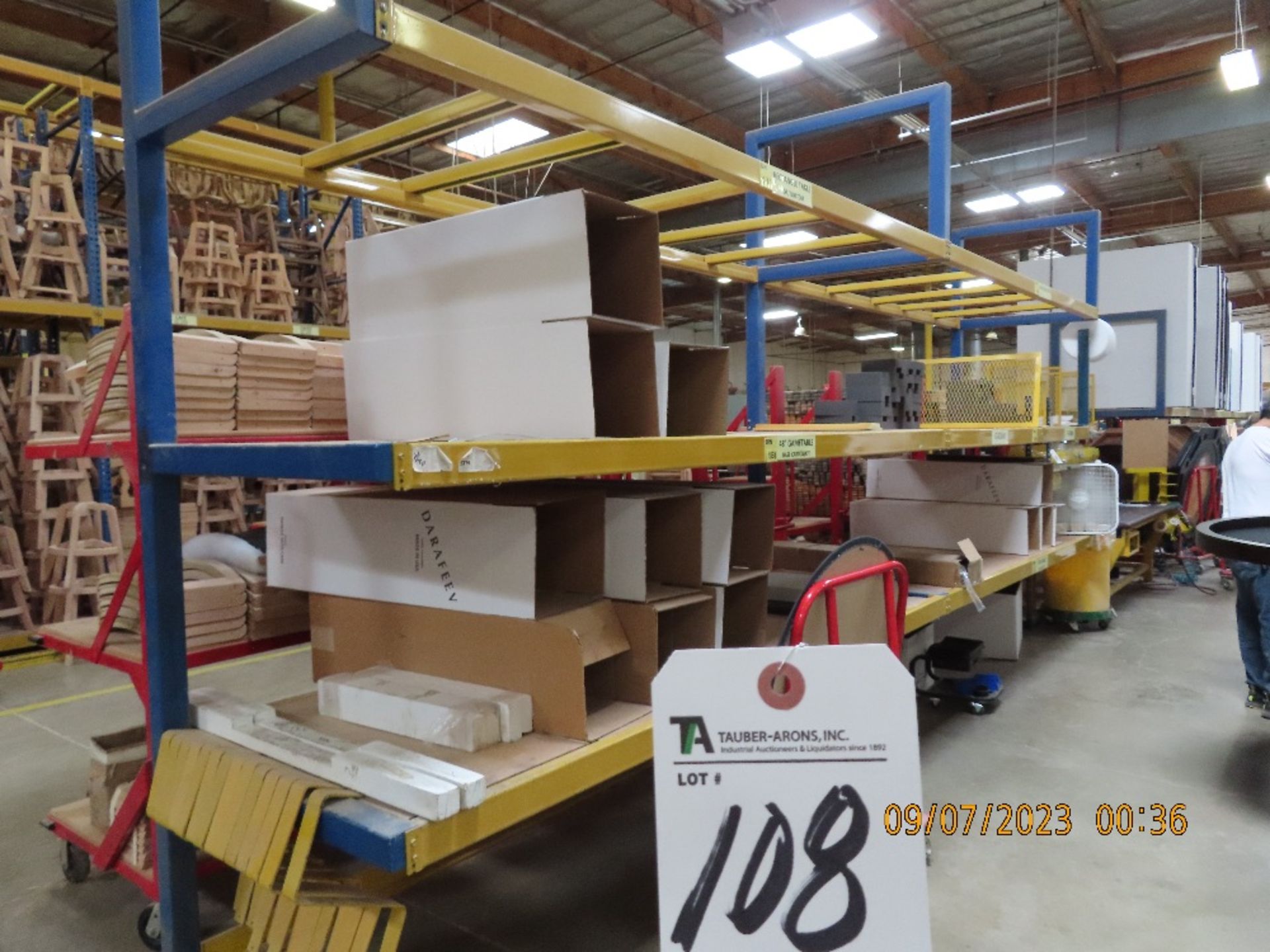 (Lot) Approx. 90'L, Assembly Tables w/ PartsBins, Self-Standing Shelves (No Contents of Carts)