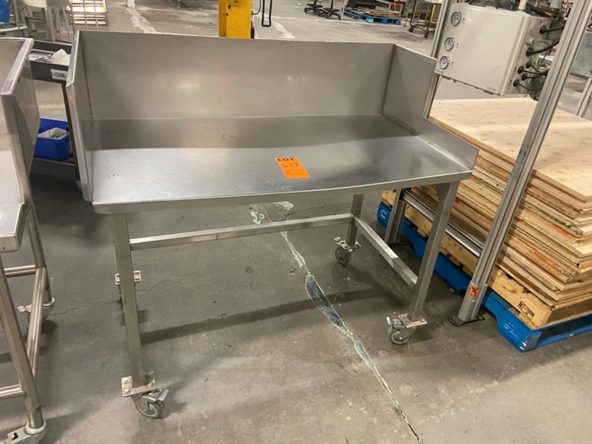 S/S Operator's Table, with S/S Side Walls S/S Back Splash, Mounted on S/S Frame with Casters (