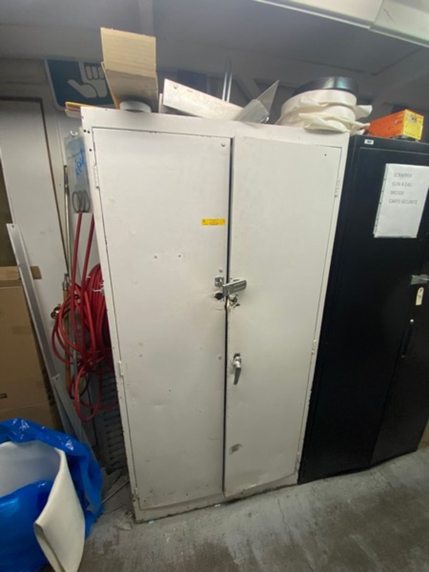 Double Door Storage Cabinet, Includes Contents (LOCATED IN SAINT-LAMBERT, QC)