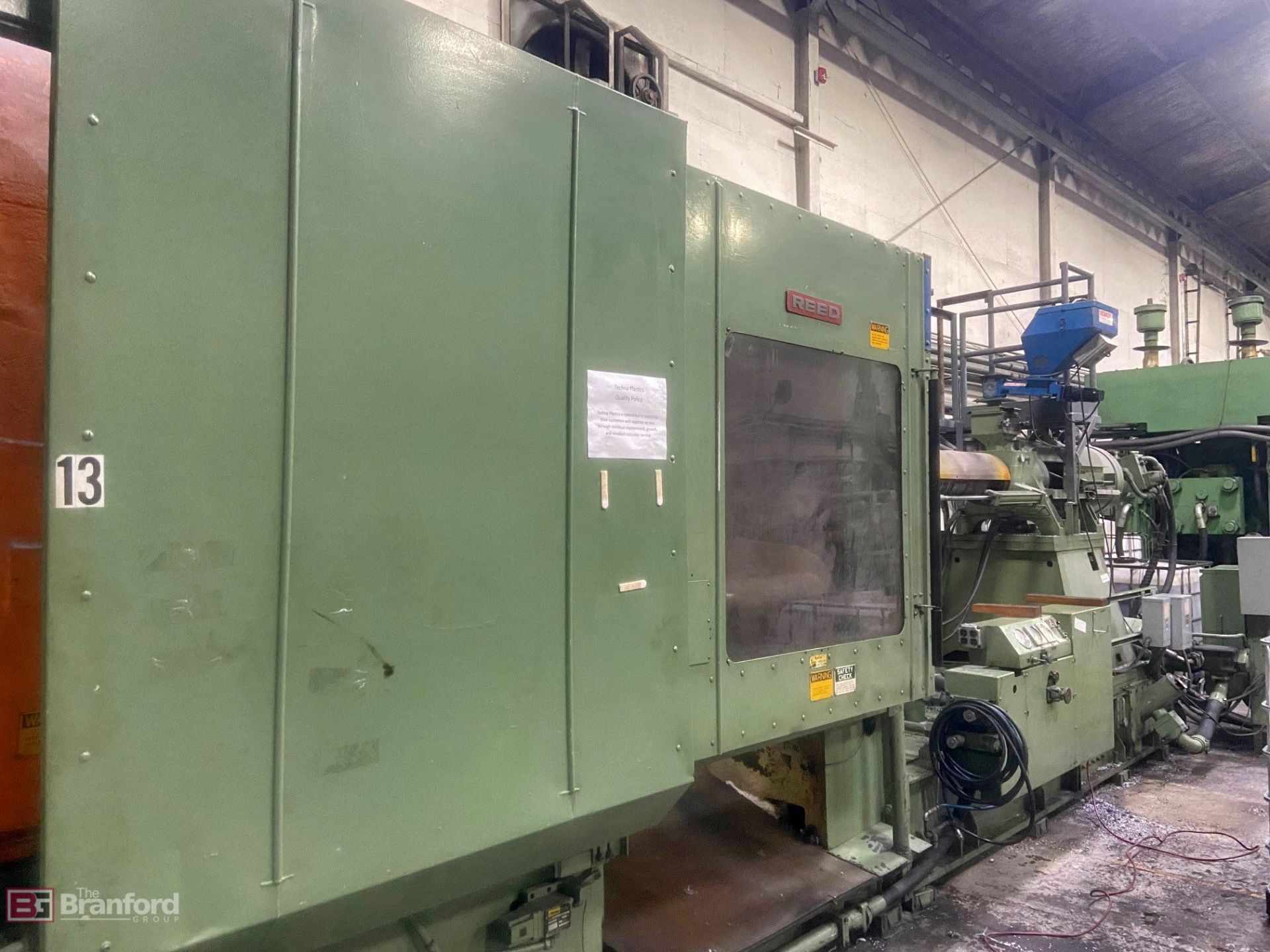 Reed 700TE 700-ton injection molding machine