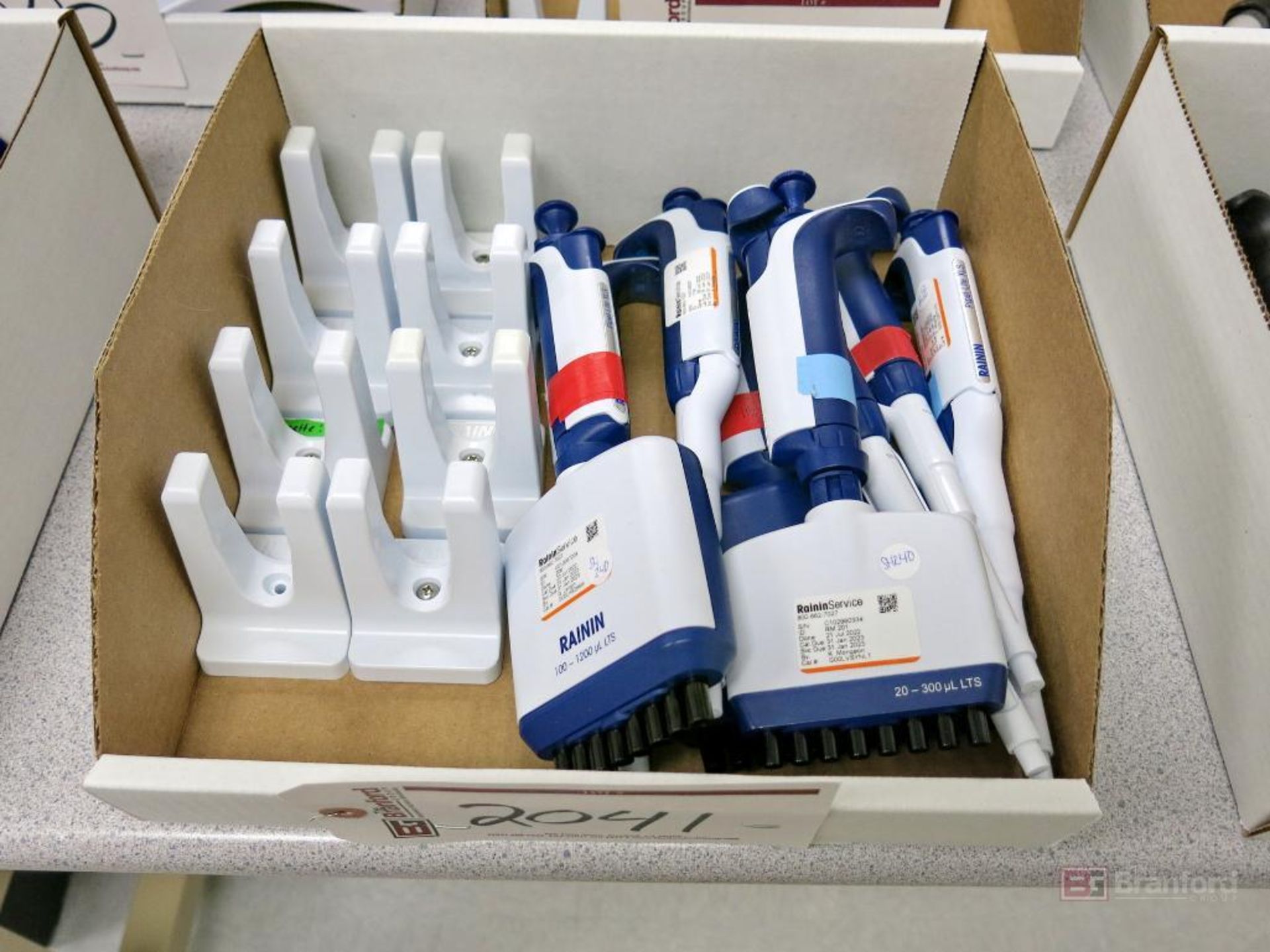 Lot of (8) Rainin Various Sized Manual Pipettes w/ Stands