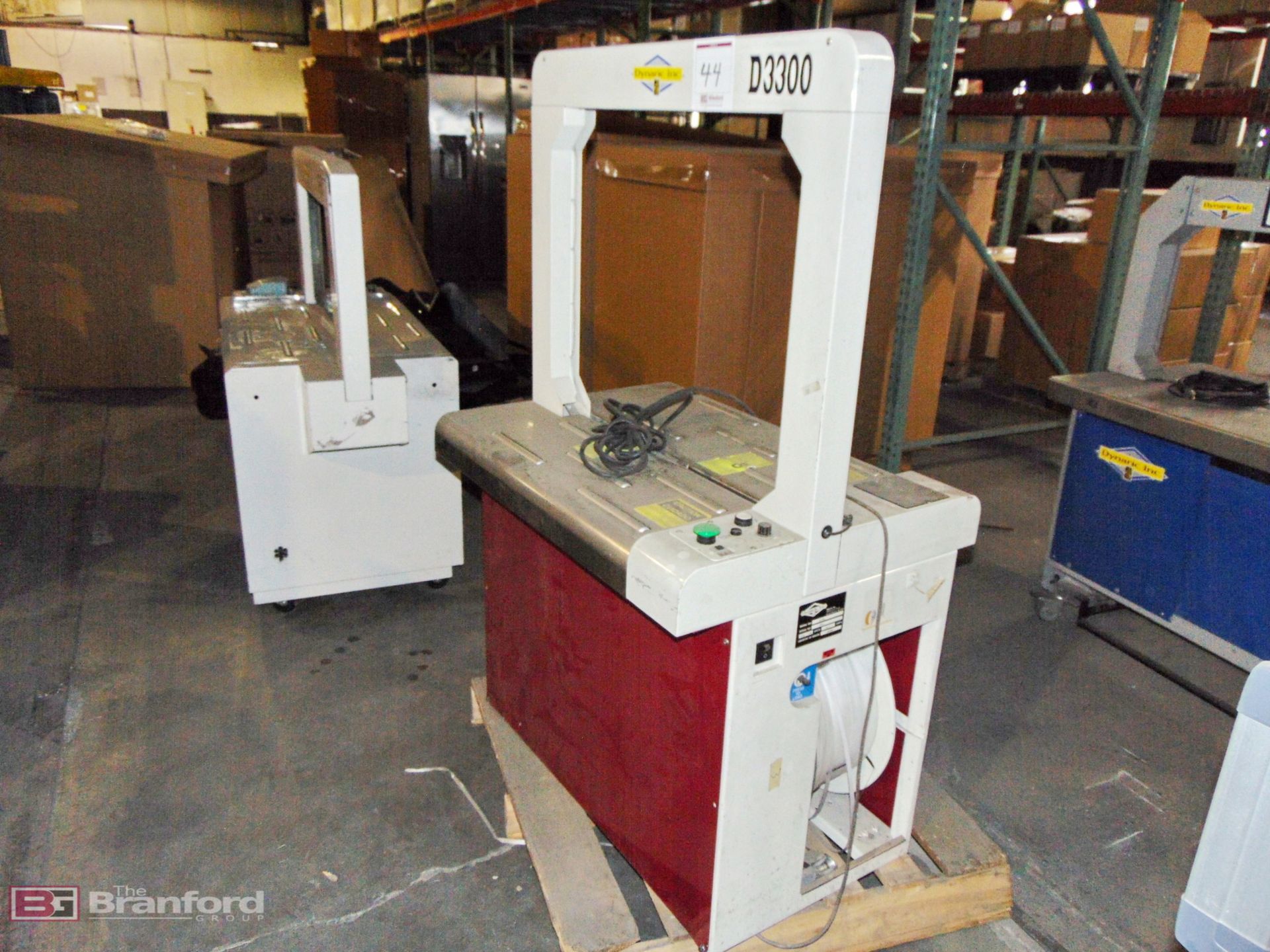 Dynaric Inc. Carton Strapping Machine