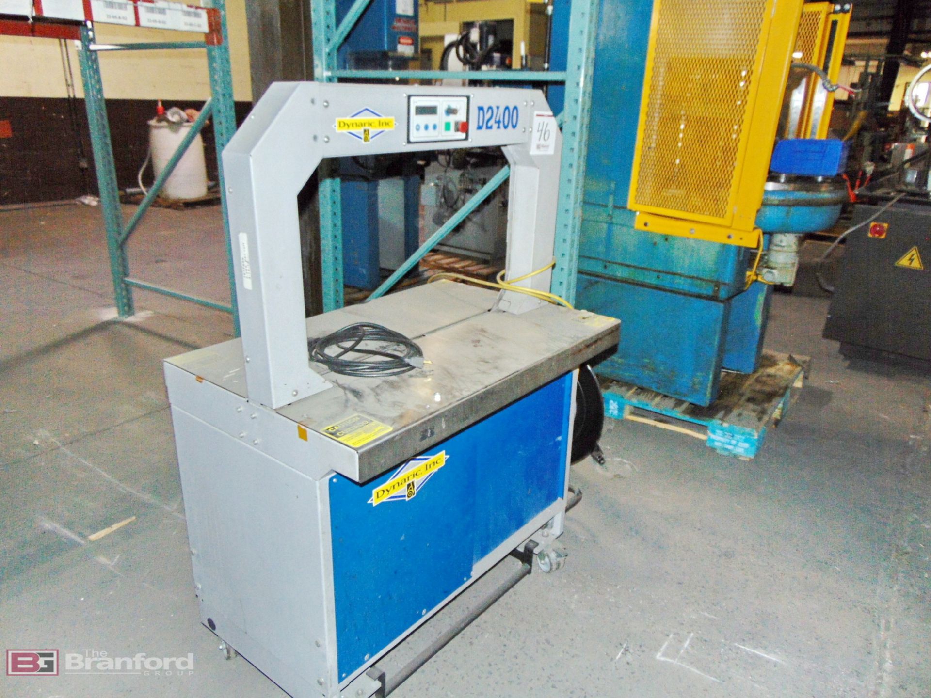 Dynaric Inc. Carton Strapping Machine