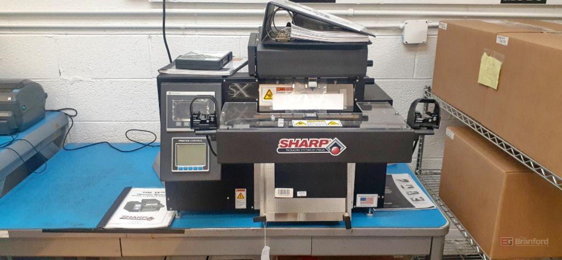 Sharp SXtm Model 1152-02, Continuous Roll Bagging System