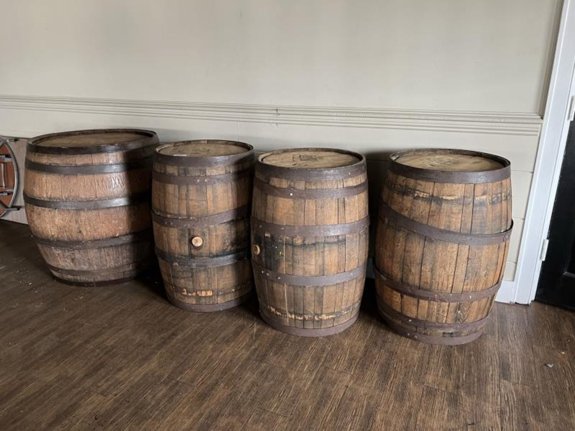 Lot of (4) Whiskey Barrows; all 3' Tall with (3) 22" Diameter & (1) 30" Diameter; Located in Banquet