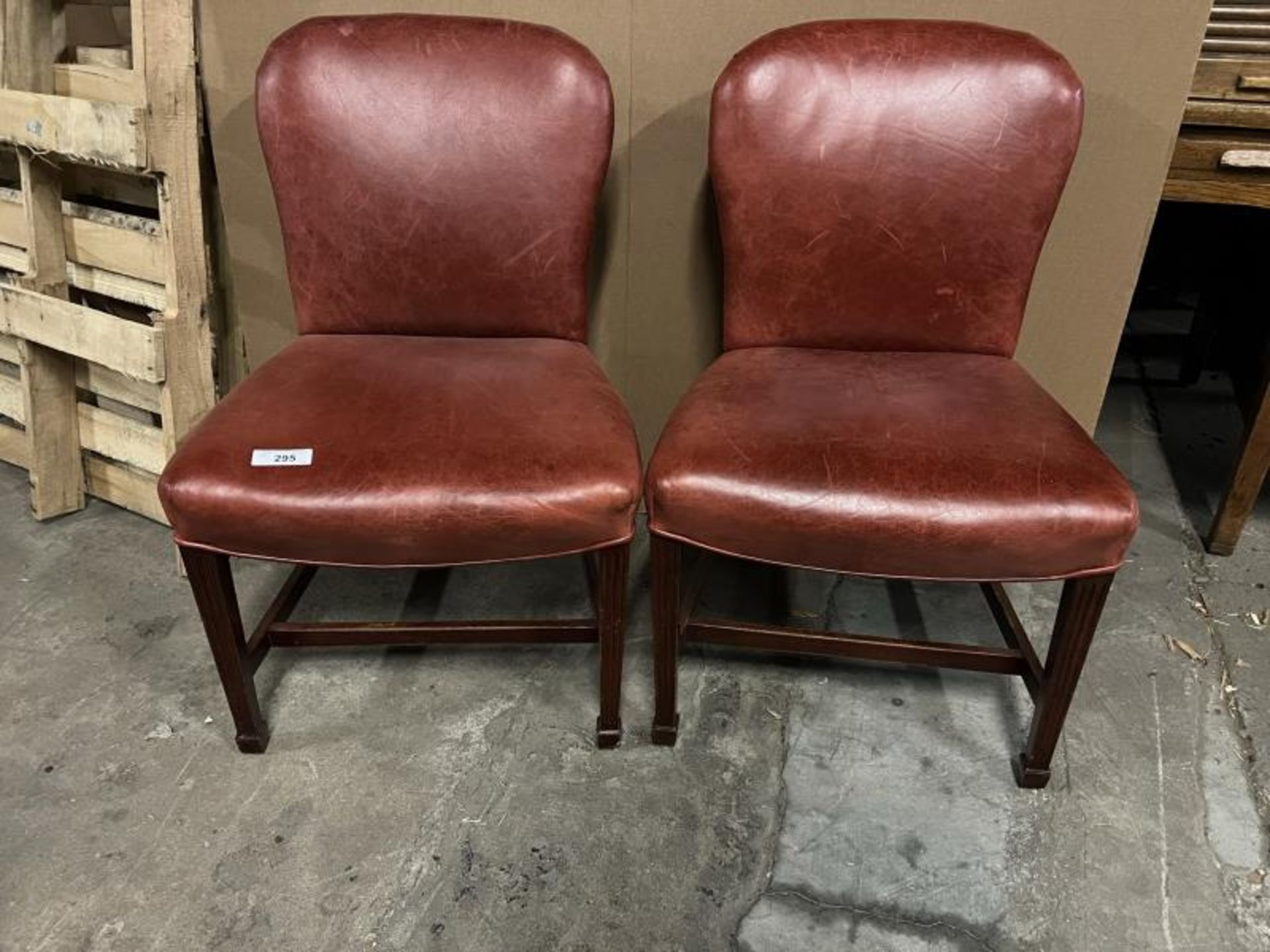 Pair of Red Vinyl Chairs; Located in Mill Building