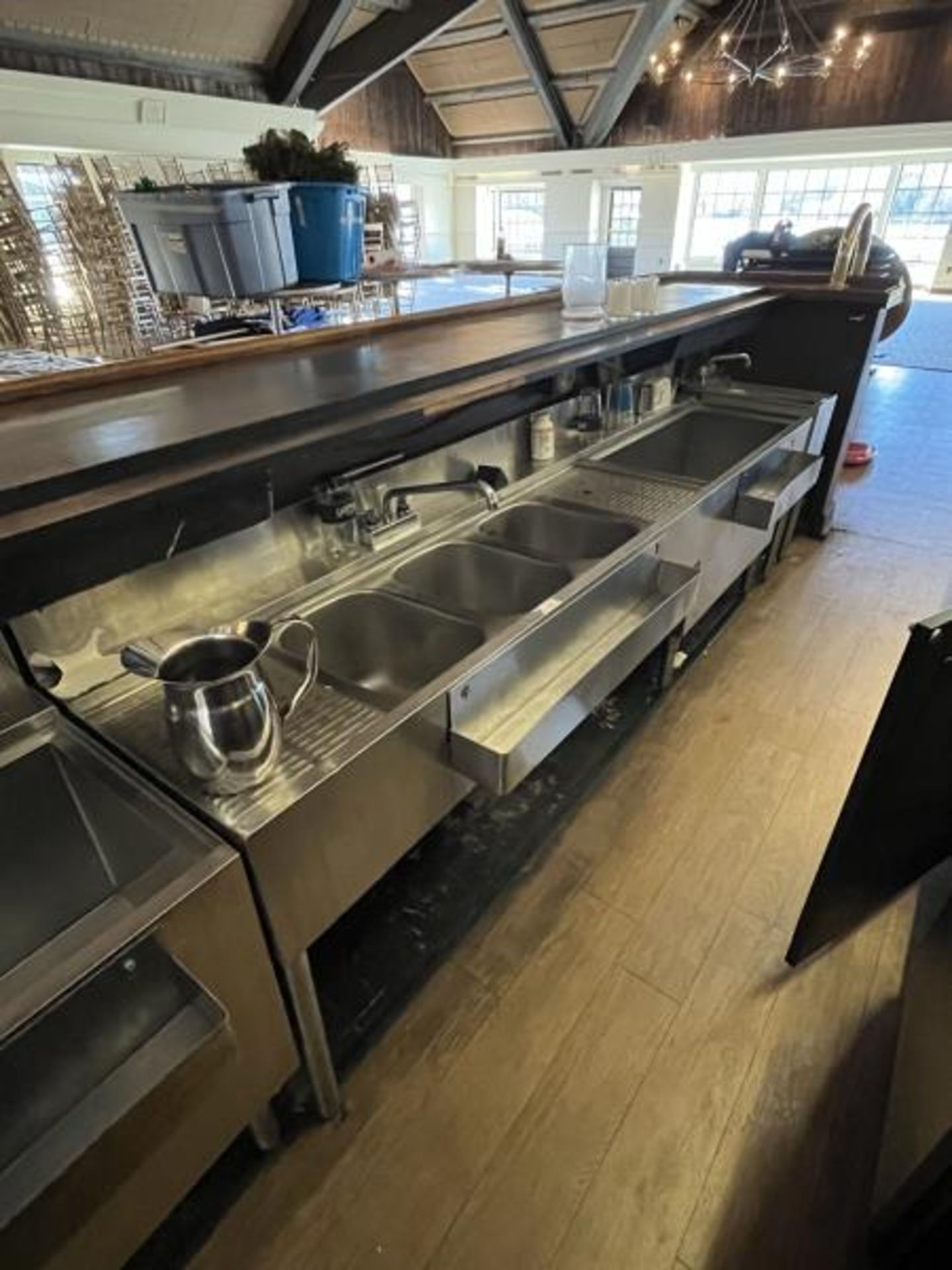 Krowne Back Bar 3-Bay Sink with Attached Ice Bin 95" Long x 23" Deep in Banquet room