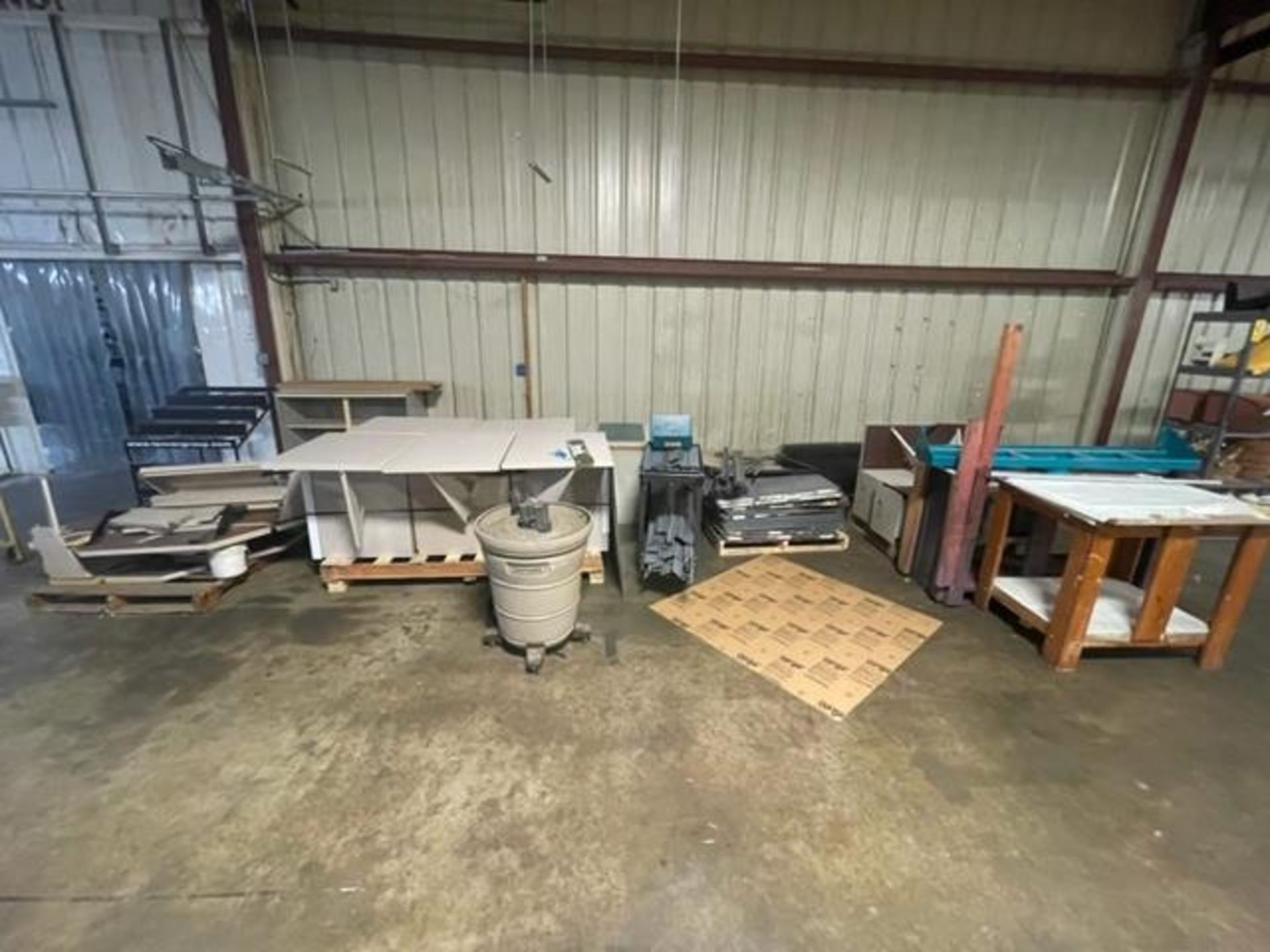 Miscellaneous disassembled shelving tables, metal cabinets, fencing, craftsman vac