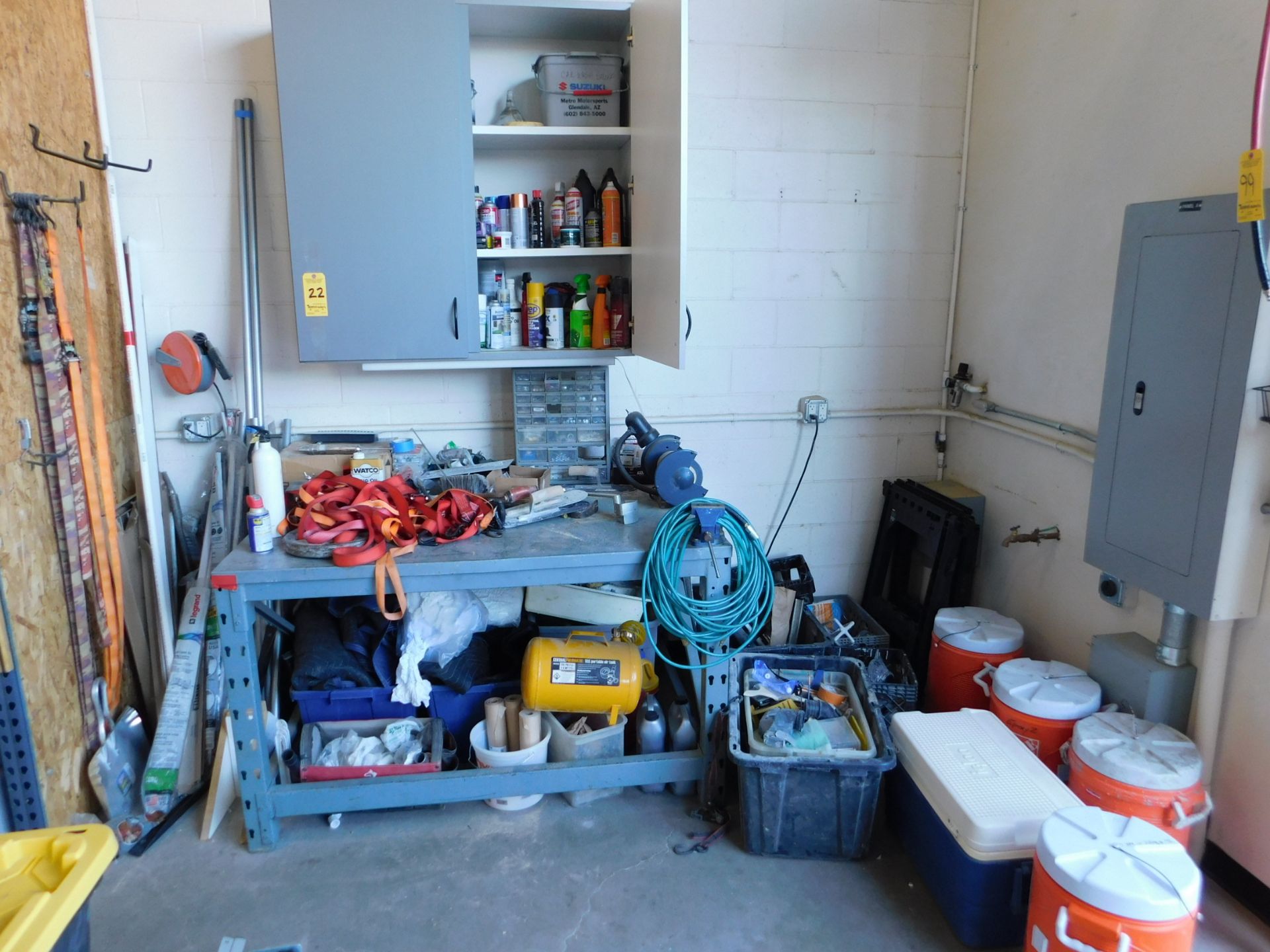 Contents of Maintenance Area including: Bench Grinder, Vice, Misc. Tools, Hardware, Paint, Wall