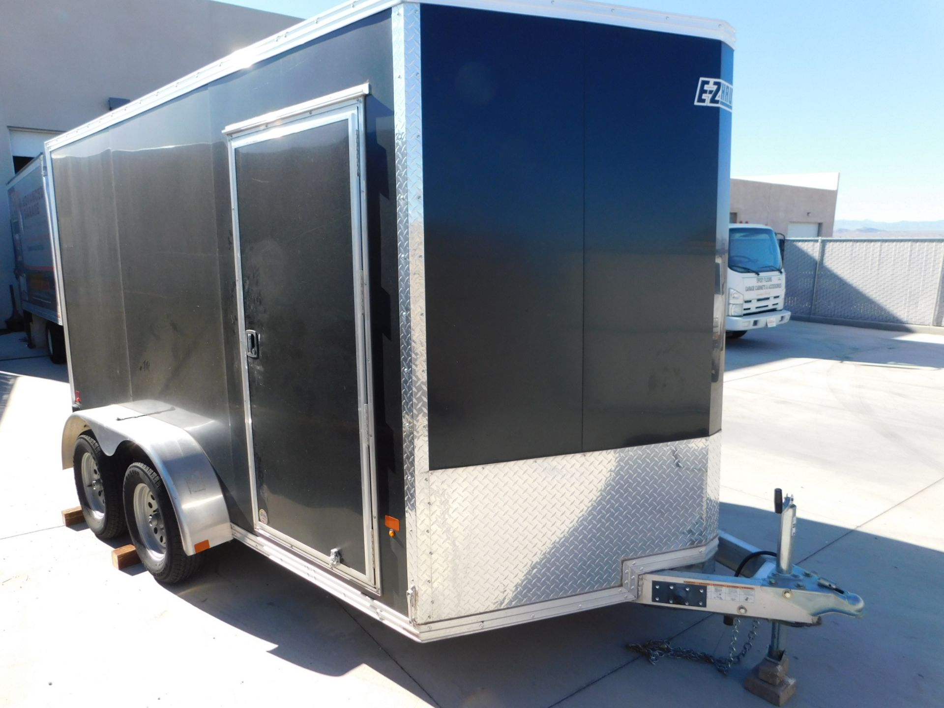 E-Z Hauler Dual Axle Enclosed Cargo Trailer, Aluminum Frame, Fold Down Rear Door, V-Nose, 12' Box,