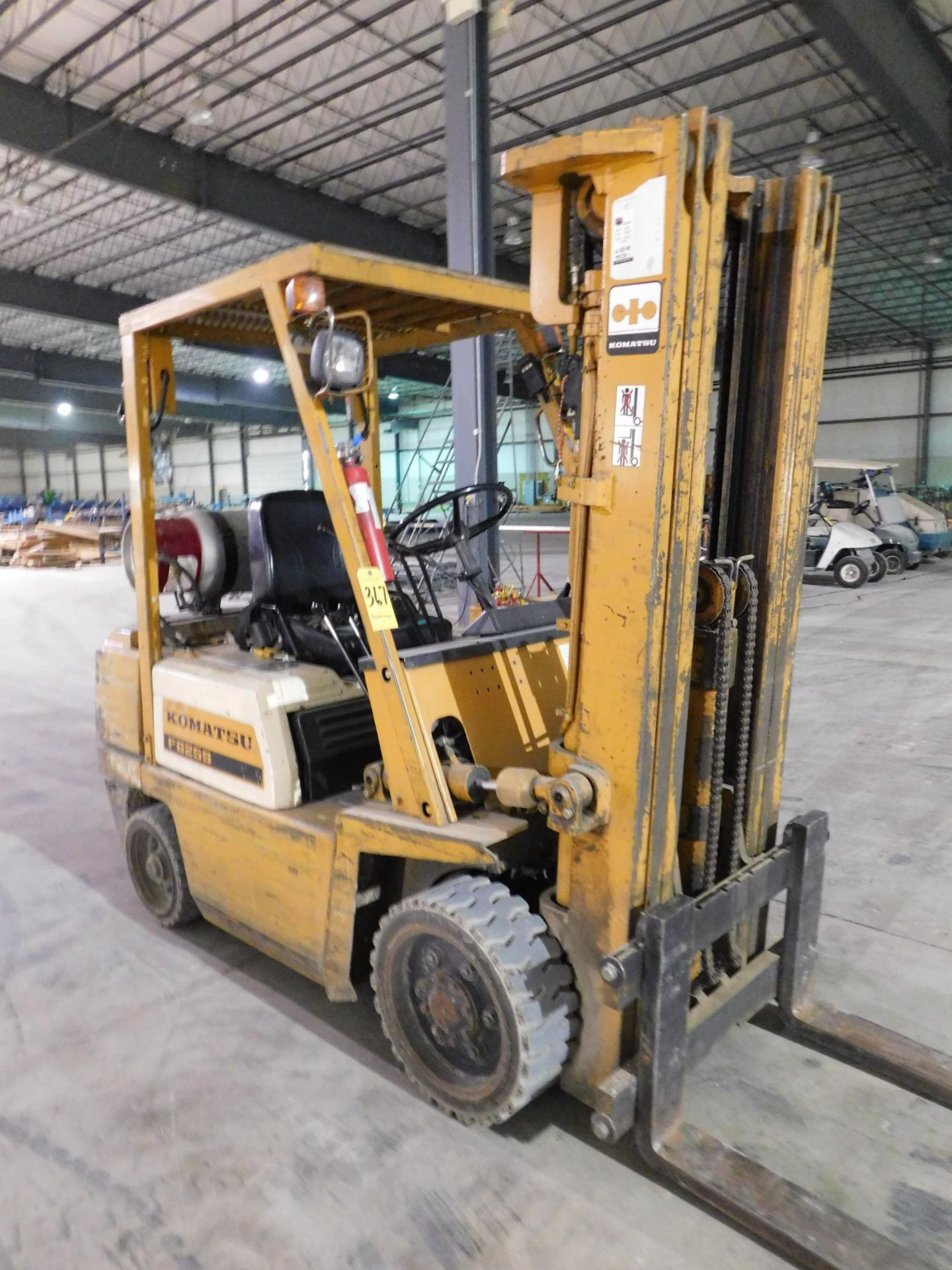 Komatsu Model FG25S-4 Fork Lift, s/n 171908, 4,480 Lb. Capacity, LP, Hard Tire, 3-Stage Mast, 4'