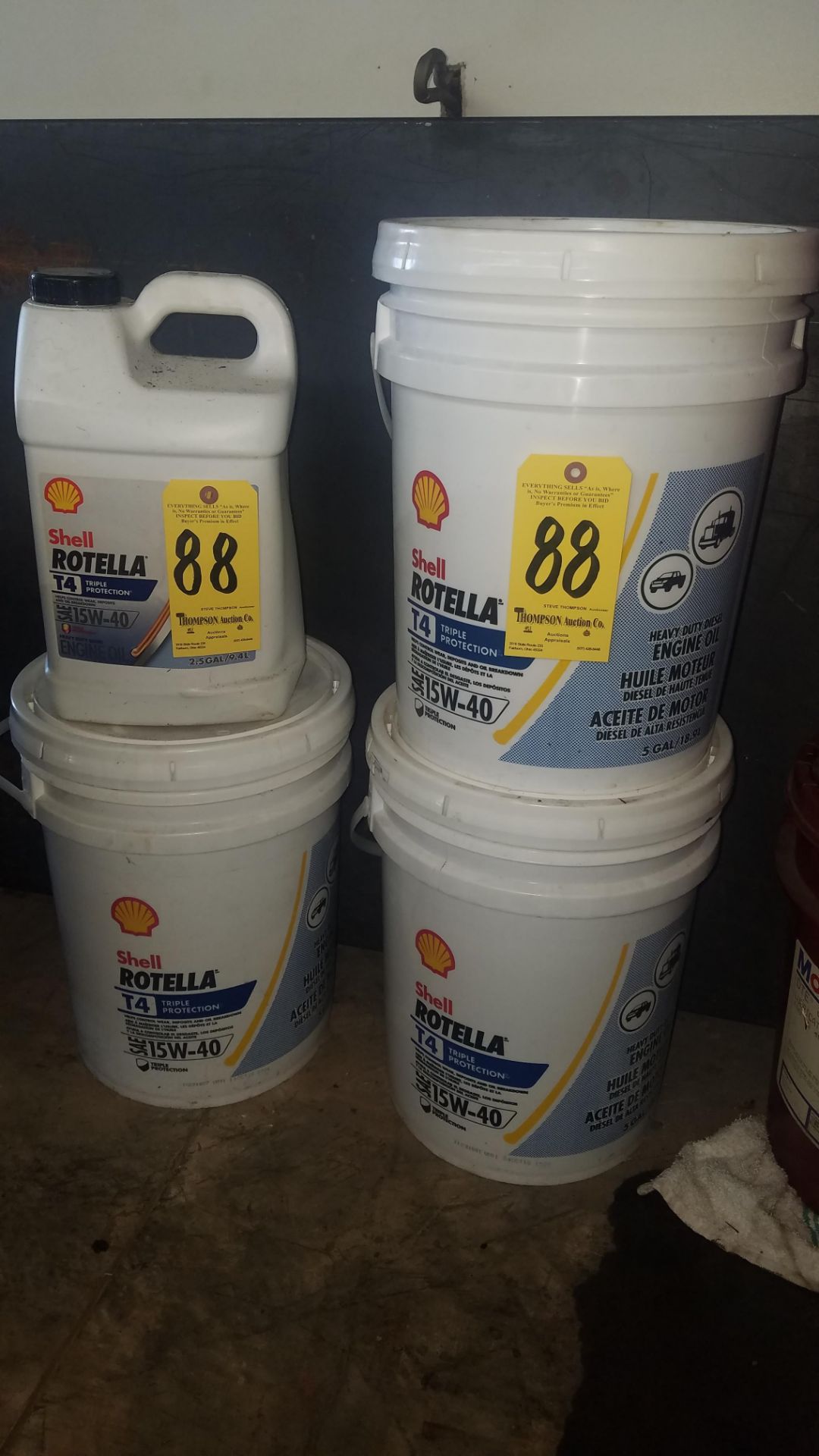 (3) 5 gallon pails of Shell Rotella 15W40 oil, and (1) 2.5 gallon jug of Shell Rotella 15W40 oil.