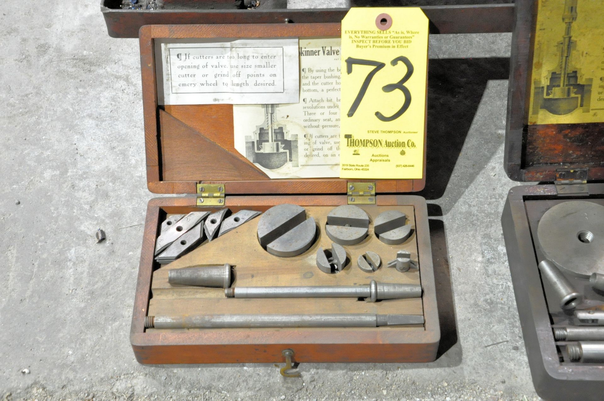 Skinner Valve Re-Seating Tool Set on Floor Under (1) Bench