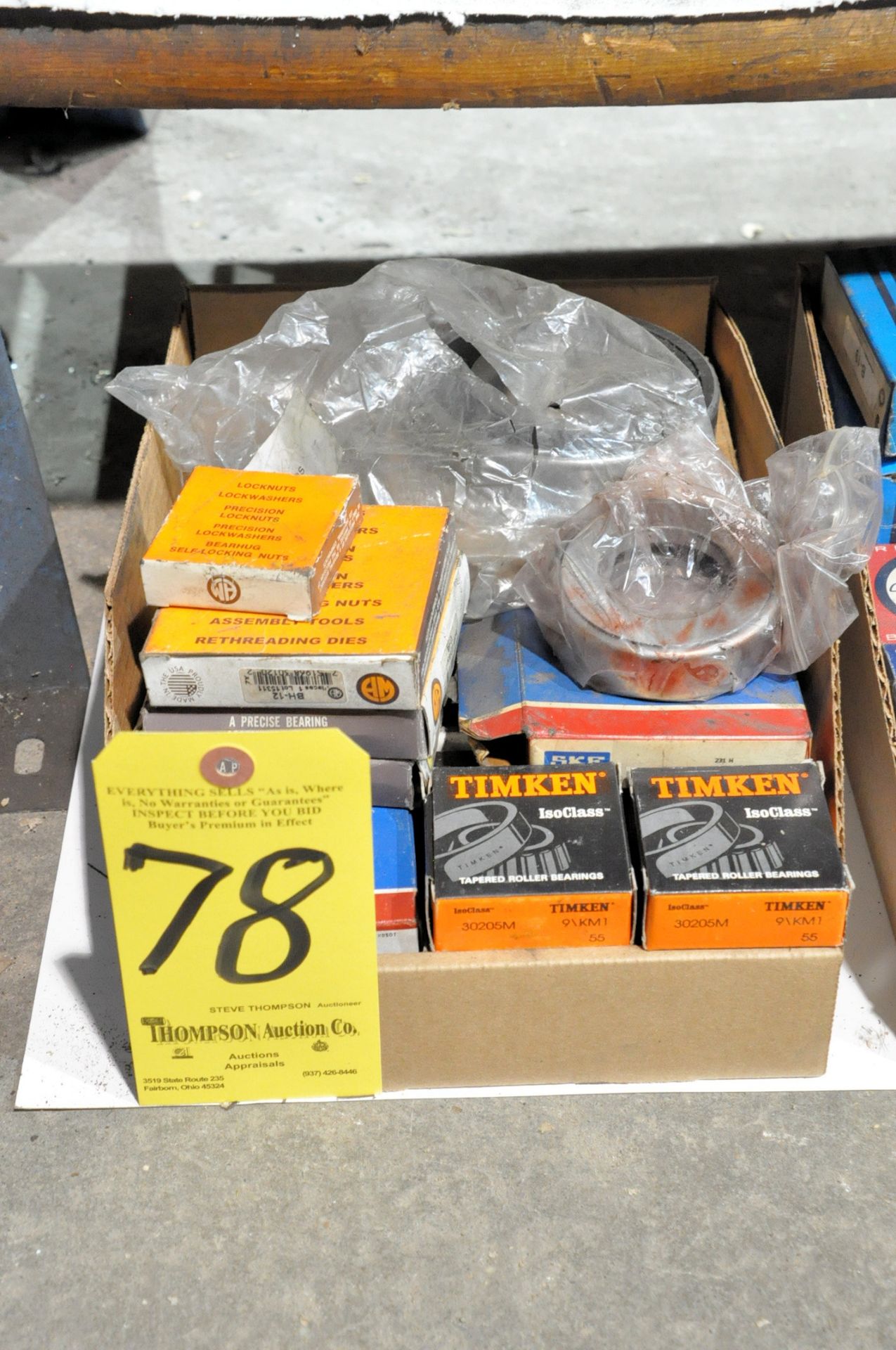 Lot-Various Bearings in (1) Box on Floor Under (1) Bench