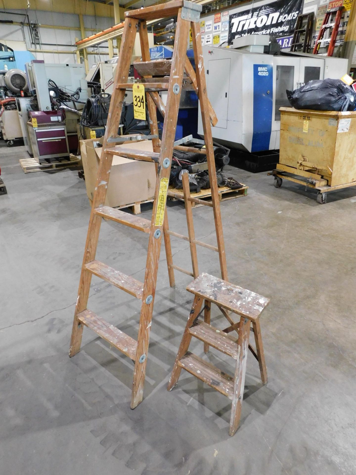 (2) Wooden Step ladders, (1) 6' & (1) 2'