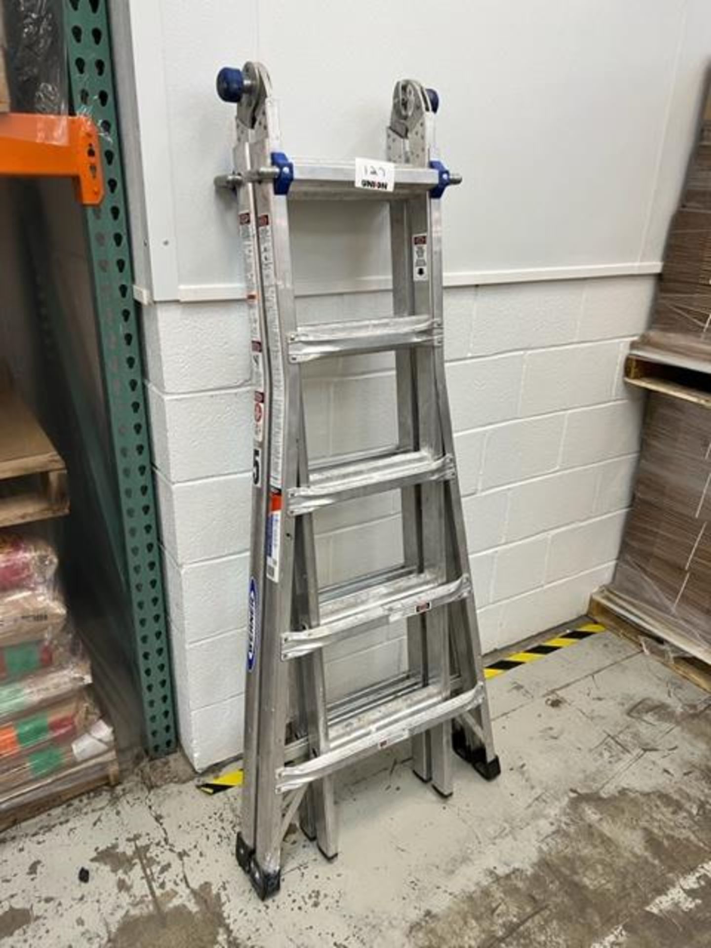 Asset 127 - Werner 12-ft foldable ladder, 300 lb capacity. $345.00 Rigged and packed on 48" x 40"