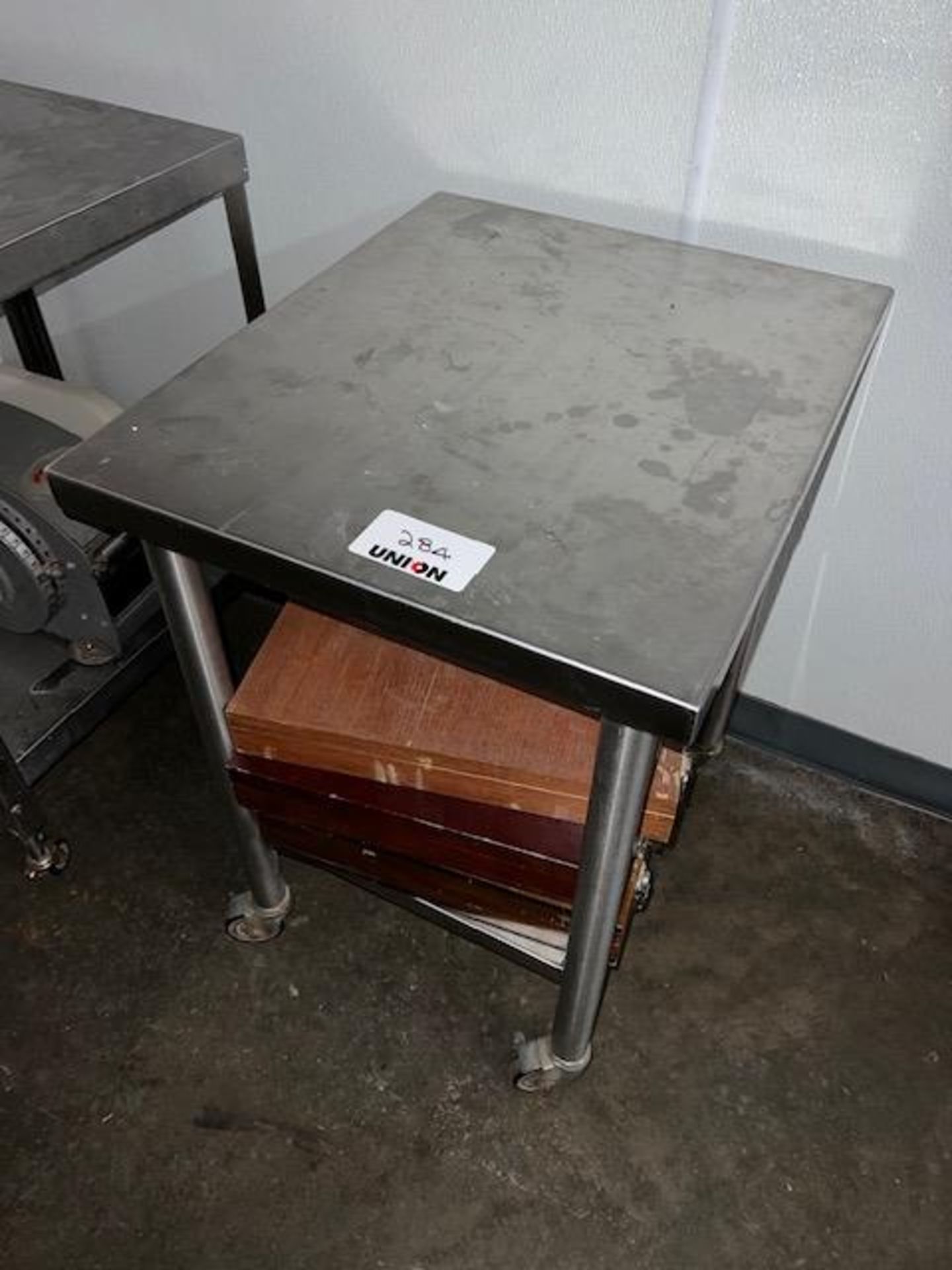 Asset 284 - 20" x 24" stainless steel table without contents. $345.00 Rigged and packed on 48" x 40"