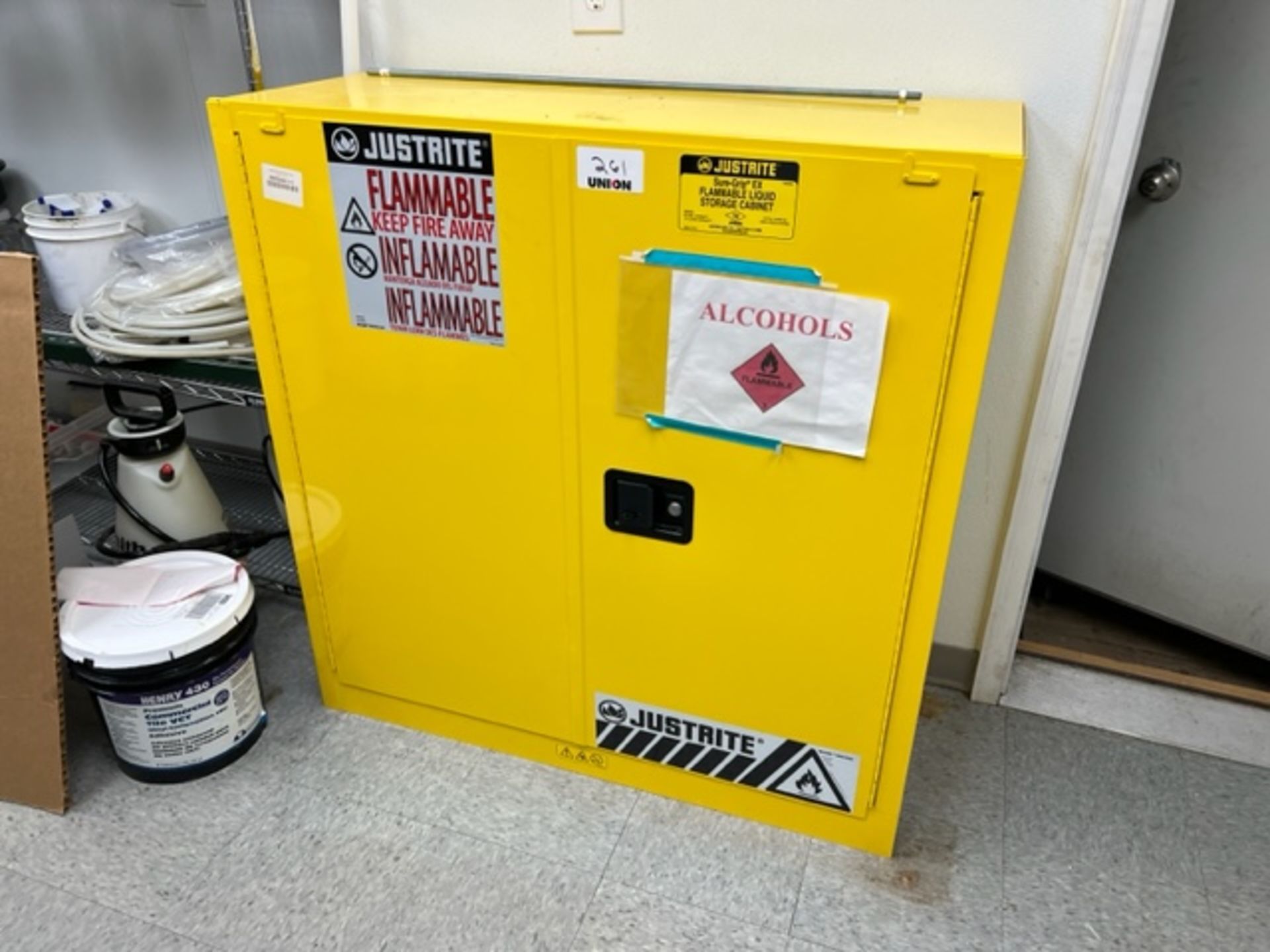 Asset 261- Justrite flammable liquid storage cabinet, 39" wide x 17" deep x 43" tall. $345.00 Rigged
