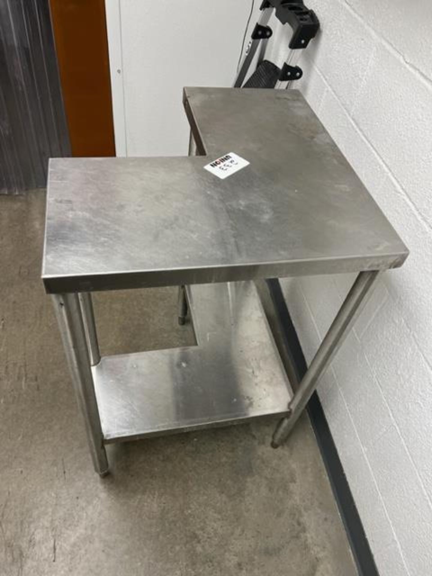 Asset 233 - Stainless steel L-shape table. $345.00 Rigged and packed on 48" x 40" pallet banded - Image 2 of 2