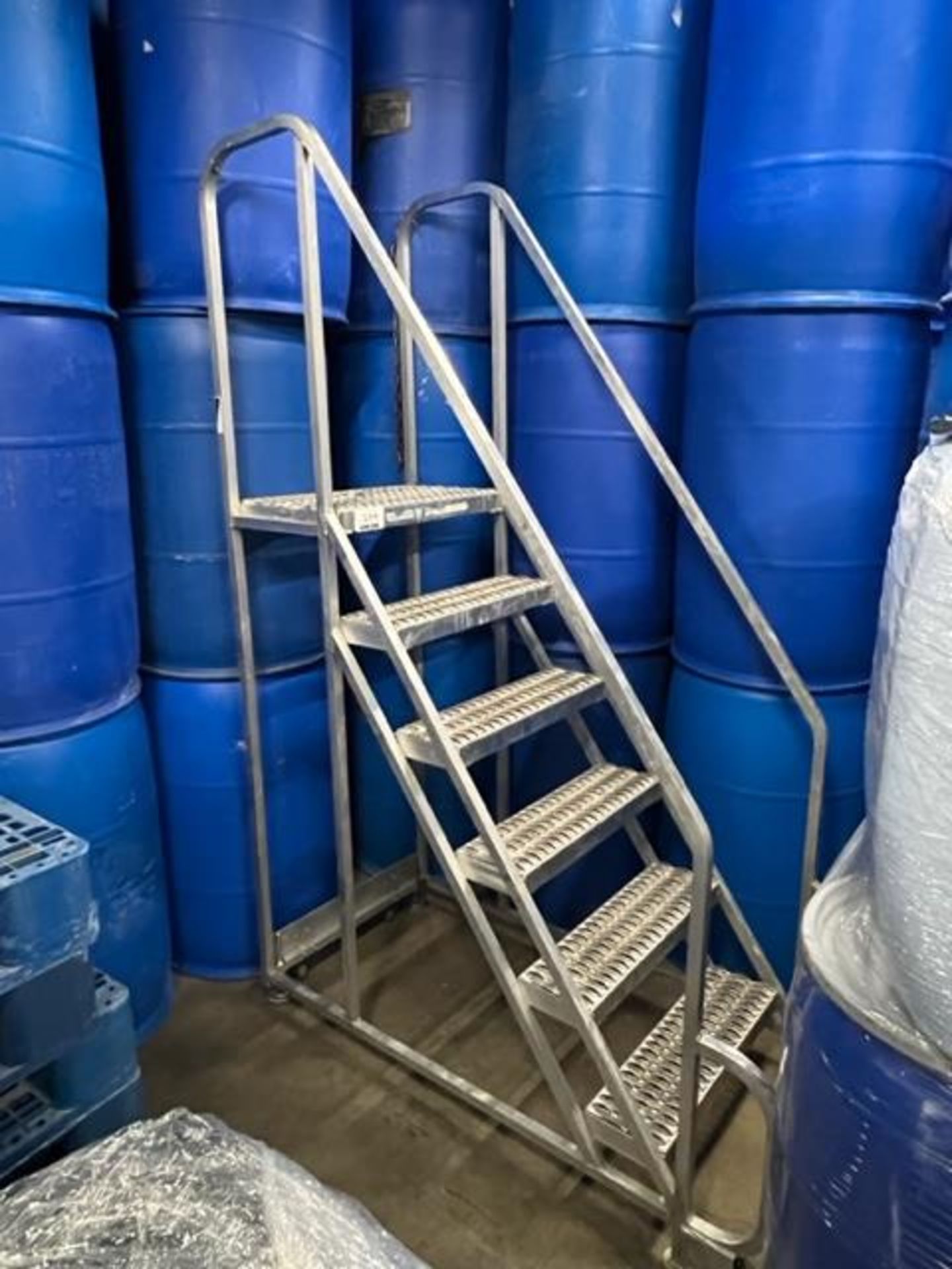 Asset 234 - Aluminum step ladder with platform. $345.00 Rigged and packed on 48" x 40" pallet banded