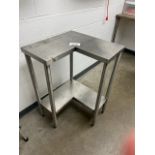Asset 233 - Stainless steel L-shape table. $345.00 Rigged and packed on 48" x 40" pallet banded