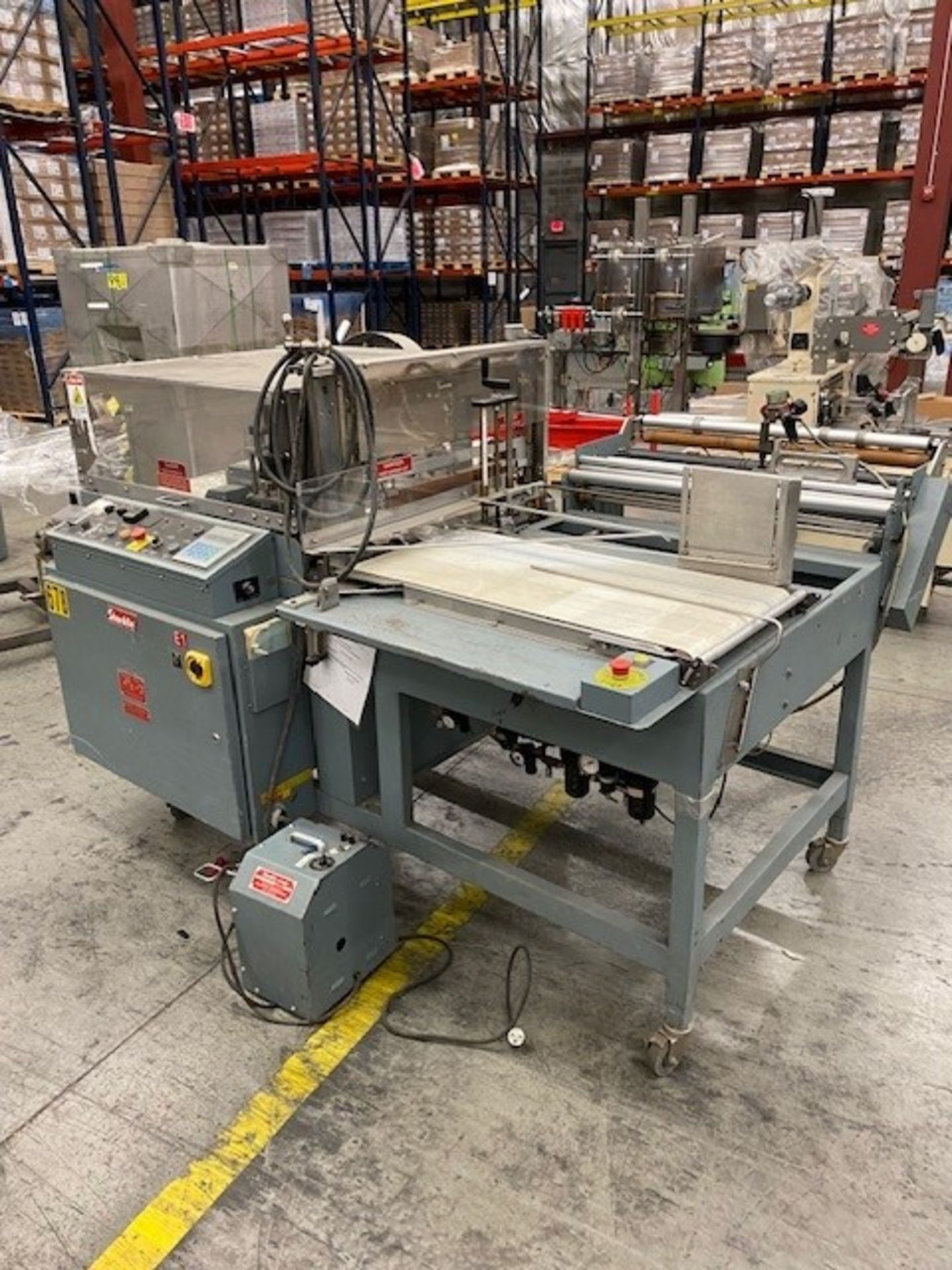Shanklin model CF-1 automatic shrink wrapper serial number C9540 with Shanklin T62 shrink tunnel