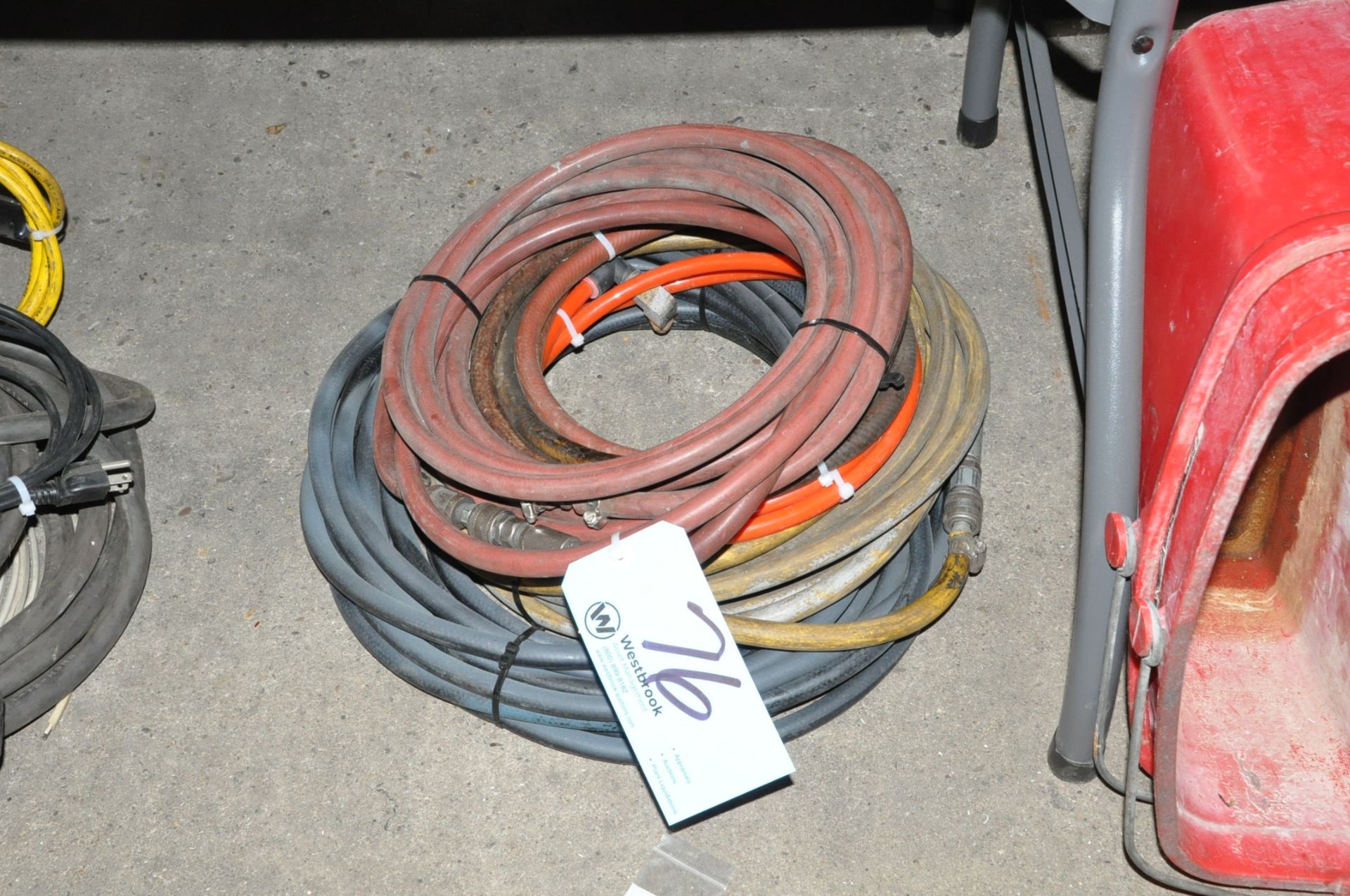 Lot-Air Hose on Floor Under (1) Table