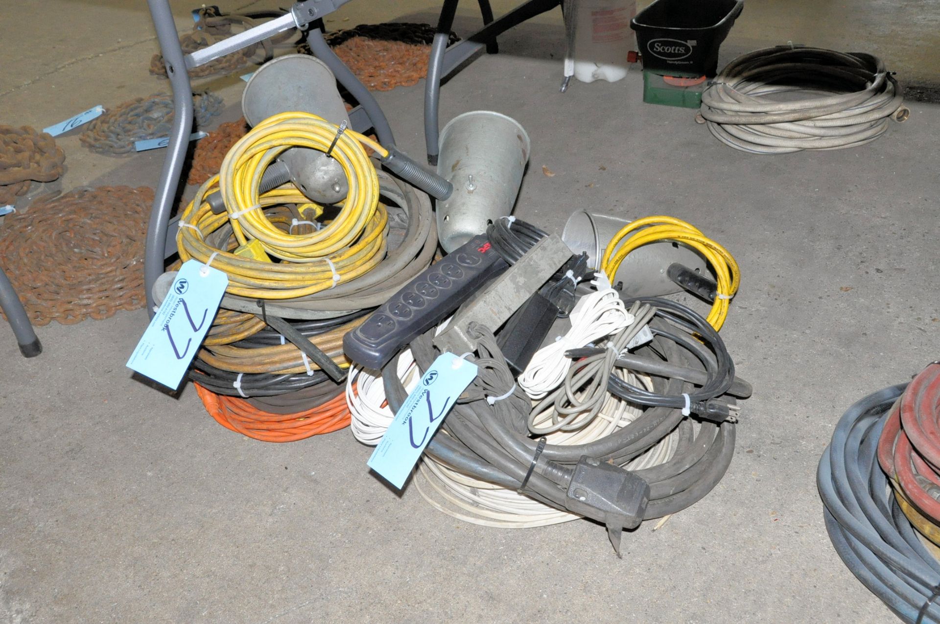 Lot-Extension Cords, Power Strips and Light on Floor Under (1) Table