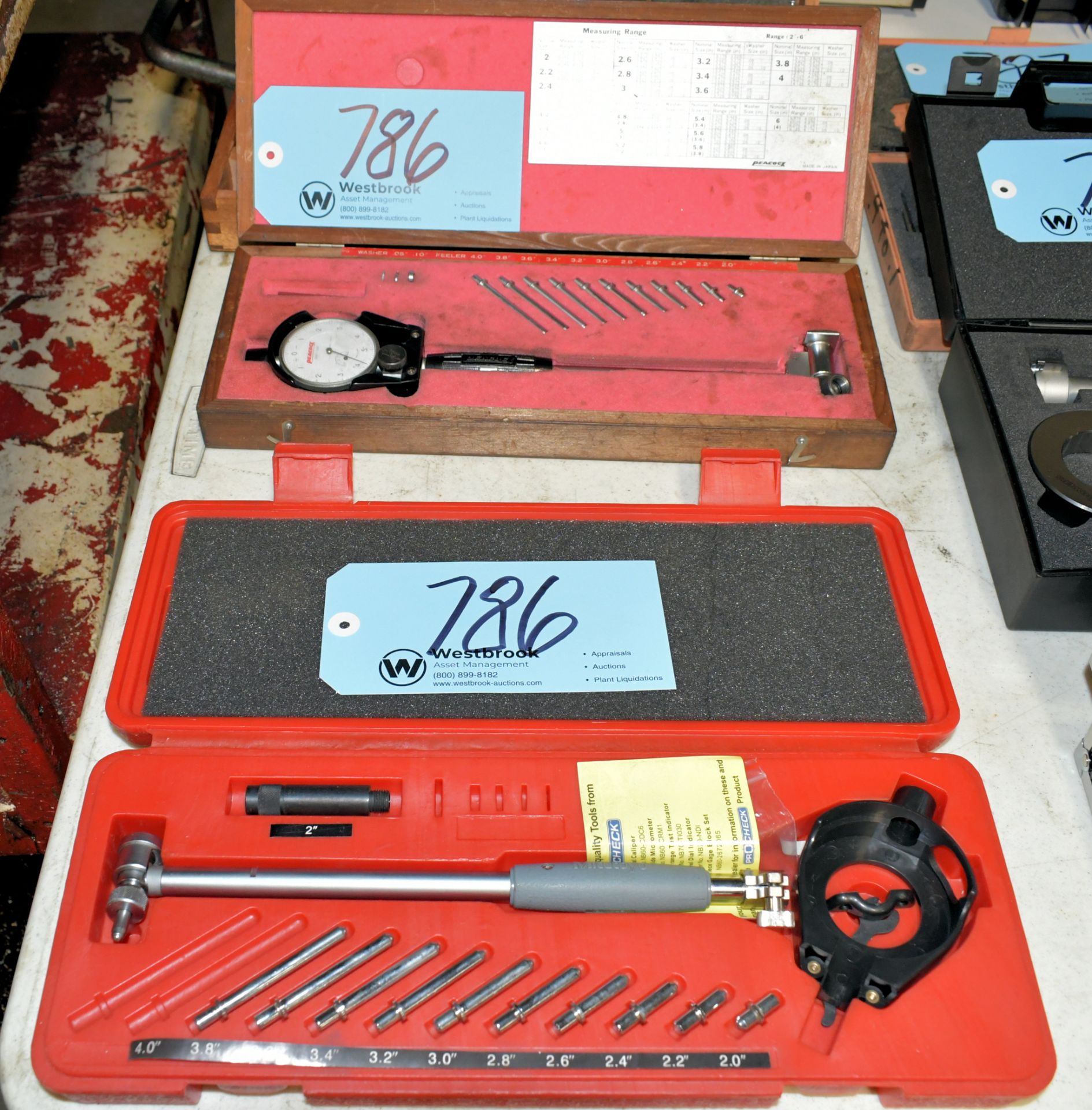 Lot-(1) Peacock Dial Bore Gauge Set and (1) Mitutoyo Partial Dial Bore Gauge Set