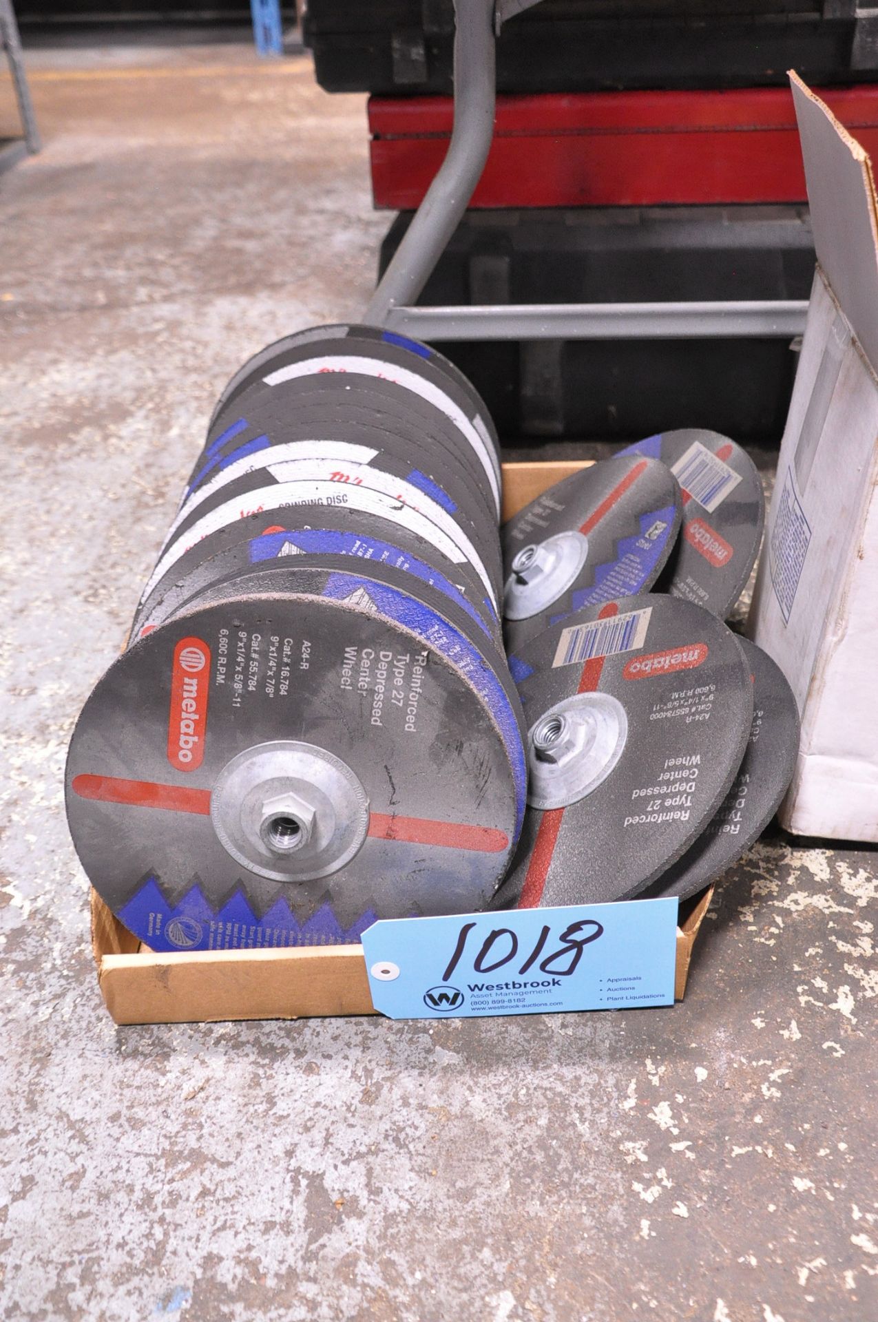 Lot-Various 9" Grinding Wheels in (1) Box on Floor Under (1) Table