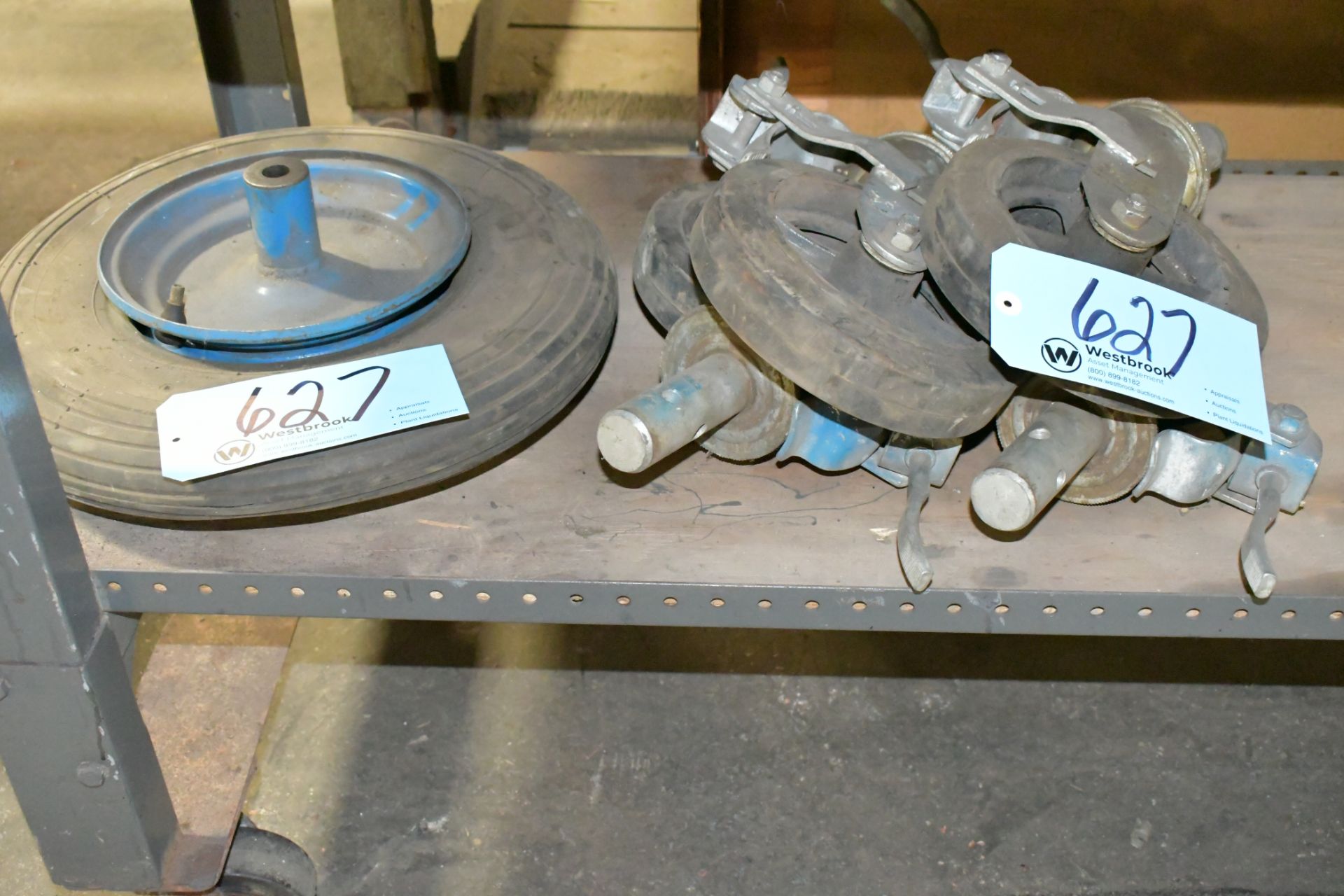 Lot-Scaffold Wheels and (1) Wheel Barrow Wheel on Shelf Under (1) Bench