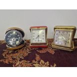 3 Vintage pocket clocks in cases
