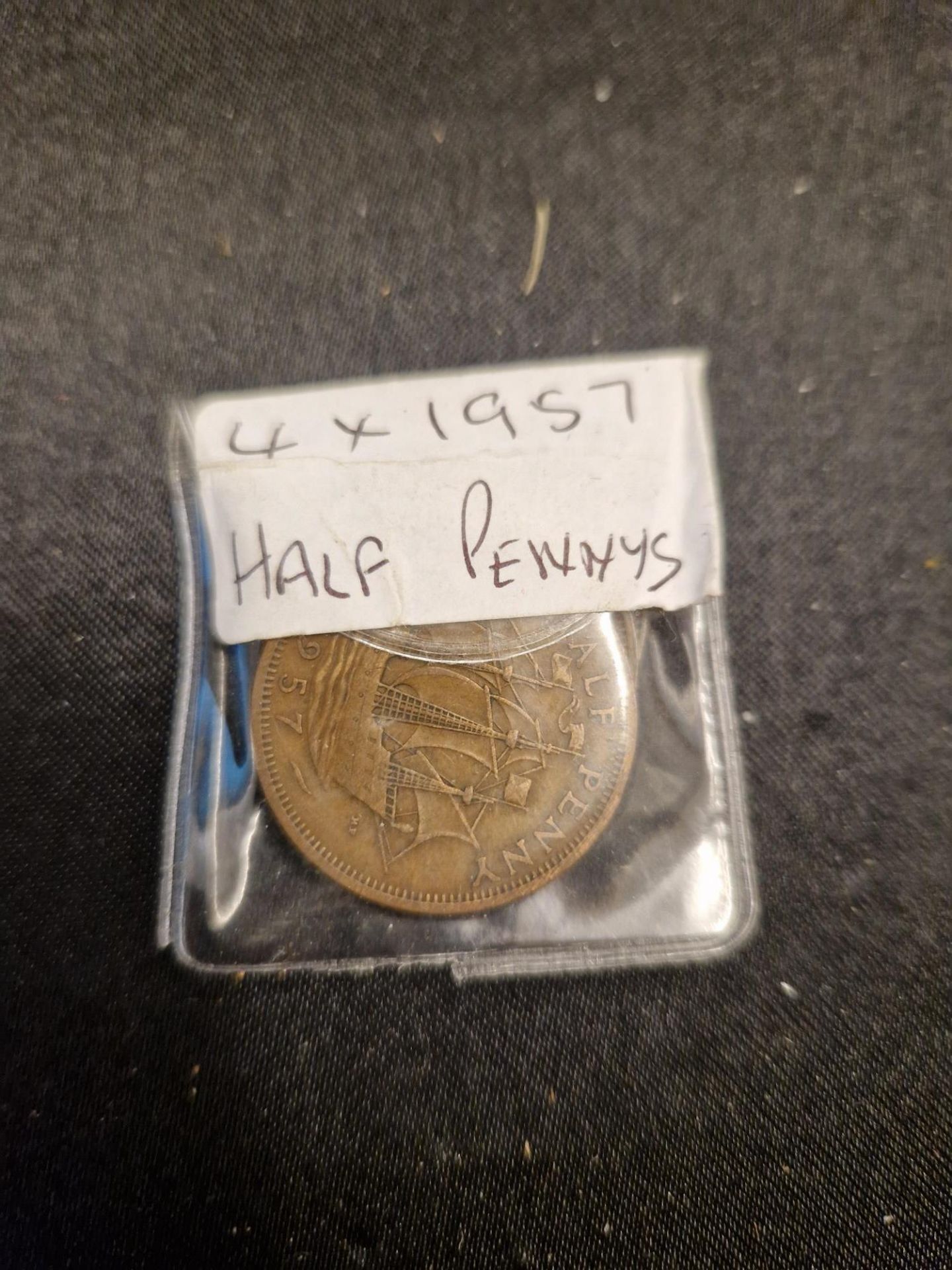 4 x 1957 half pennys