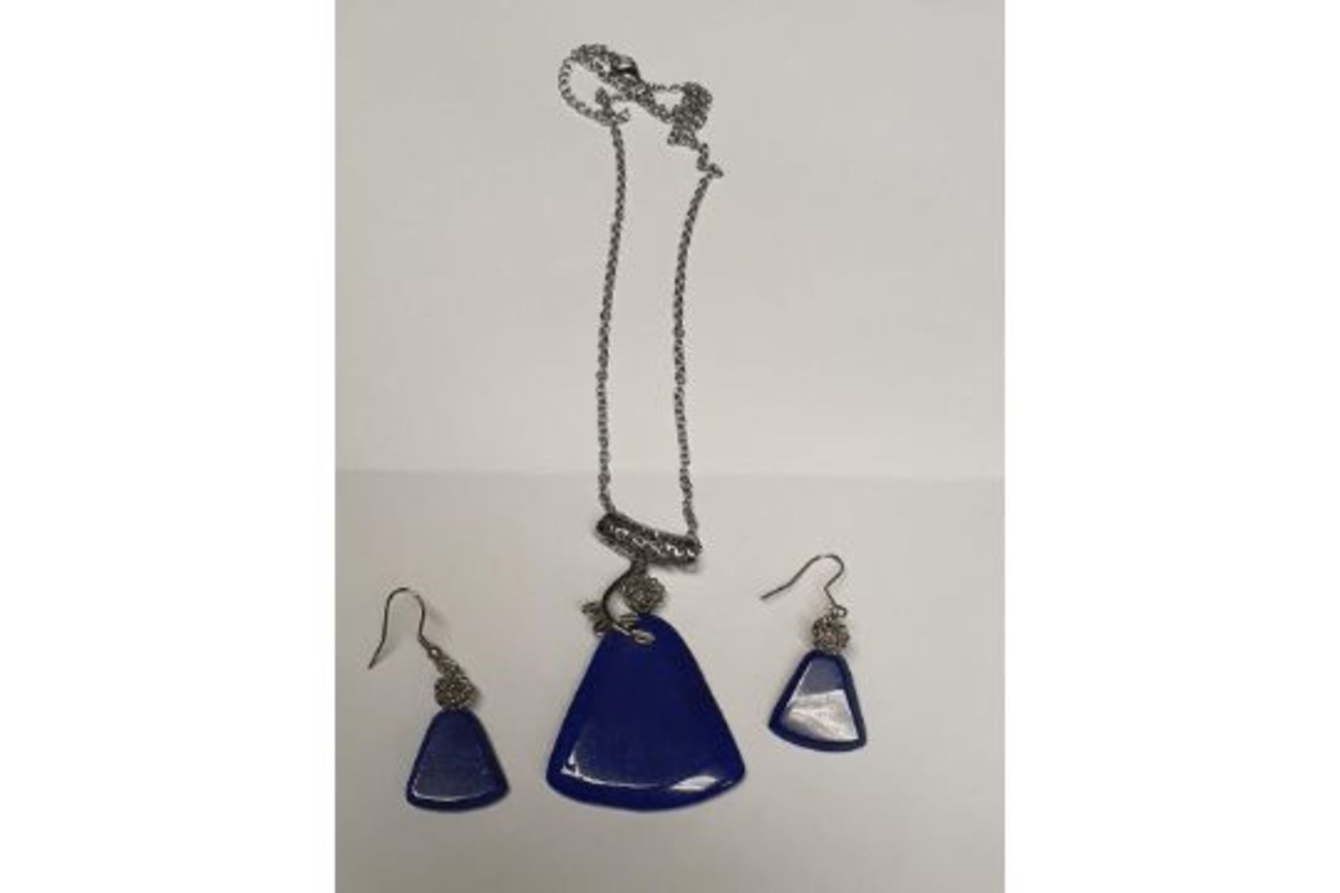 Beautiful Cobalt Blue Pendant on chain with matching earrings