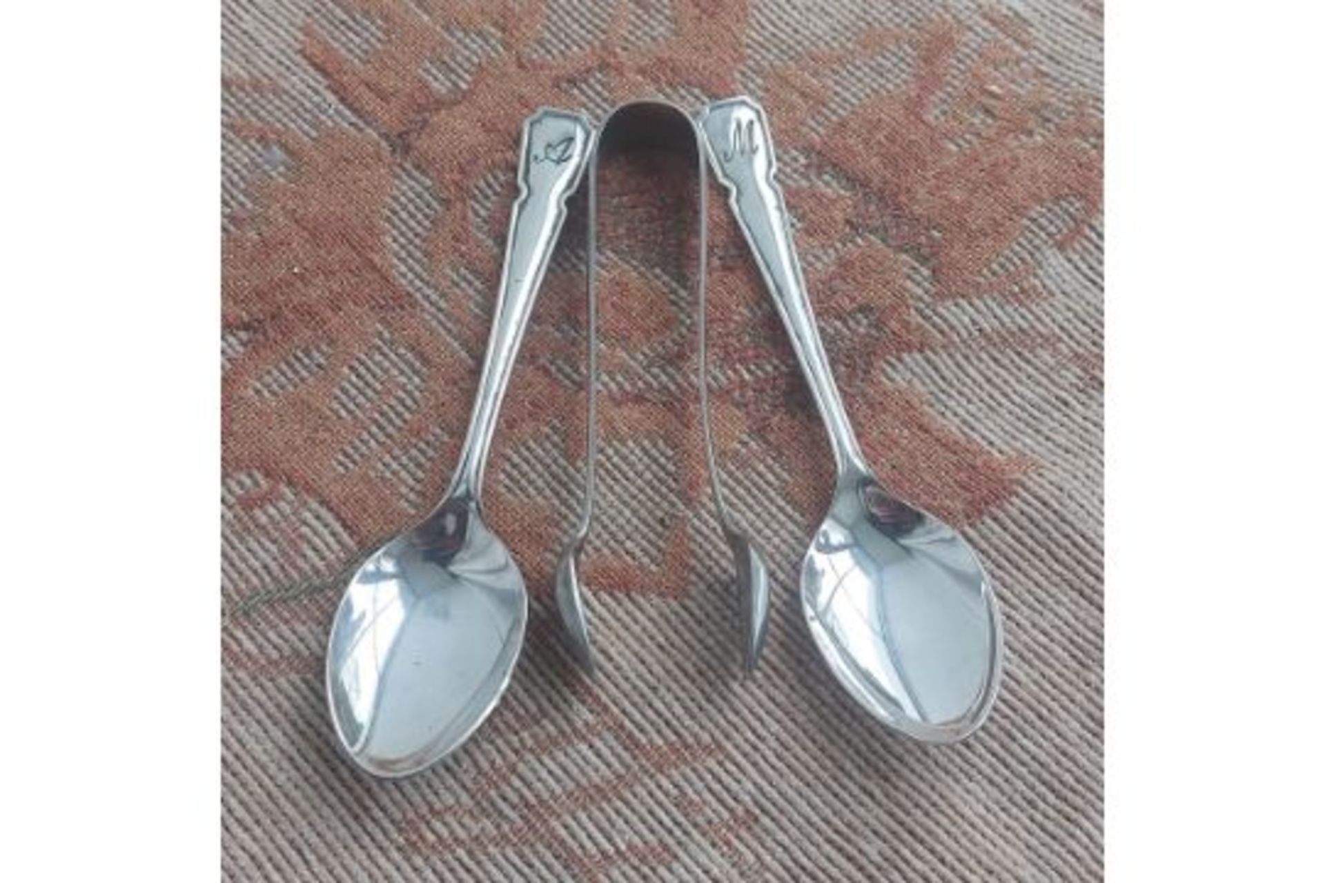 silver plate sugar tongs and spoons boxed