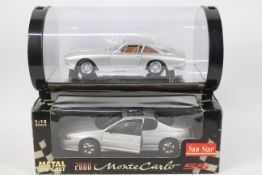 Hot Wheels - Sun Star - 2 x boxed 1:18 scale cars,