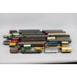 Hornby - Trix - Airfix - Lima - A collection of 33 x items of rolling stock including 12 x coaches,